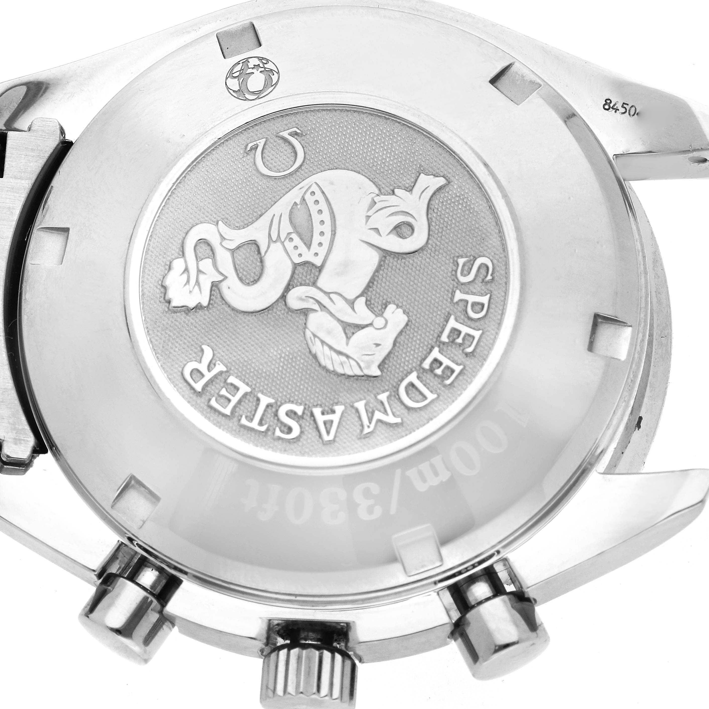 The image shows the case back and crown of an Omega Speedmaster 3210.52.00 Men
s Stainless Steel Black Dial 3210.52.00 Men
s Stainless Steel Black Dial, highlighting the engraved logo and text.