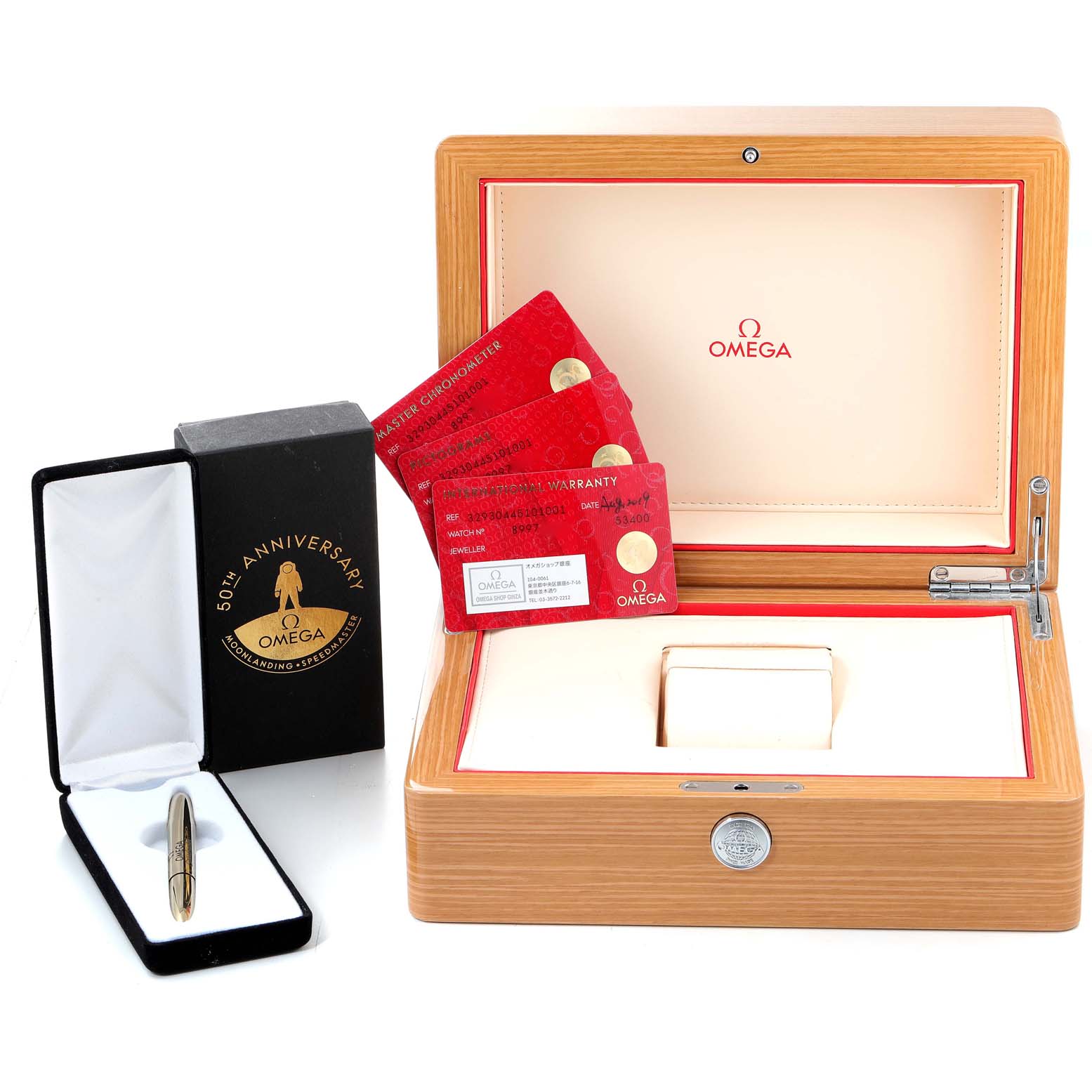 The image shows an Omega Speedmaster 329.30.44.51.01.001 Men's Stainless Steel Black Dial 329.30.44.51.01.001 Men's Stainless Steel Black Dial watch box, warranty cards, and a 50th anniversary accessory pin.