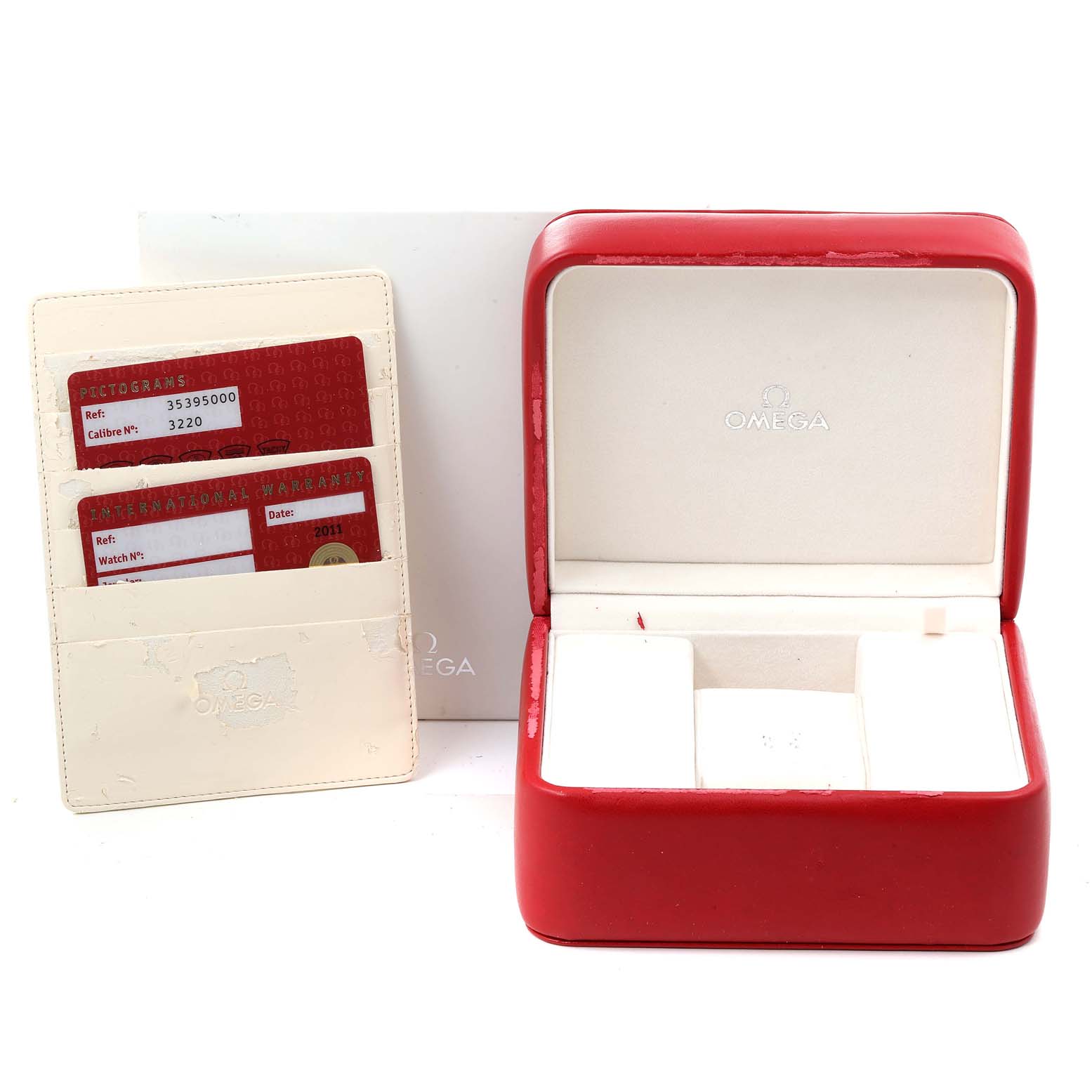 The image shows an empty Omega Speedmaster 3539.50.00 Men
s Stainless Steel Black Dial 3539.50.00 Men
s Stainless Steel Black Dial watch box, warranty cards, and a red case from a straight-on angle.