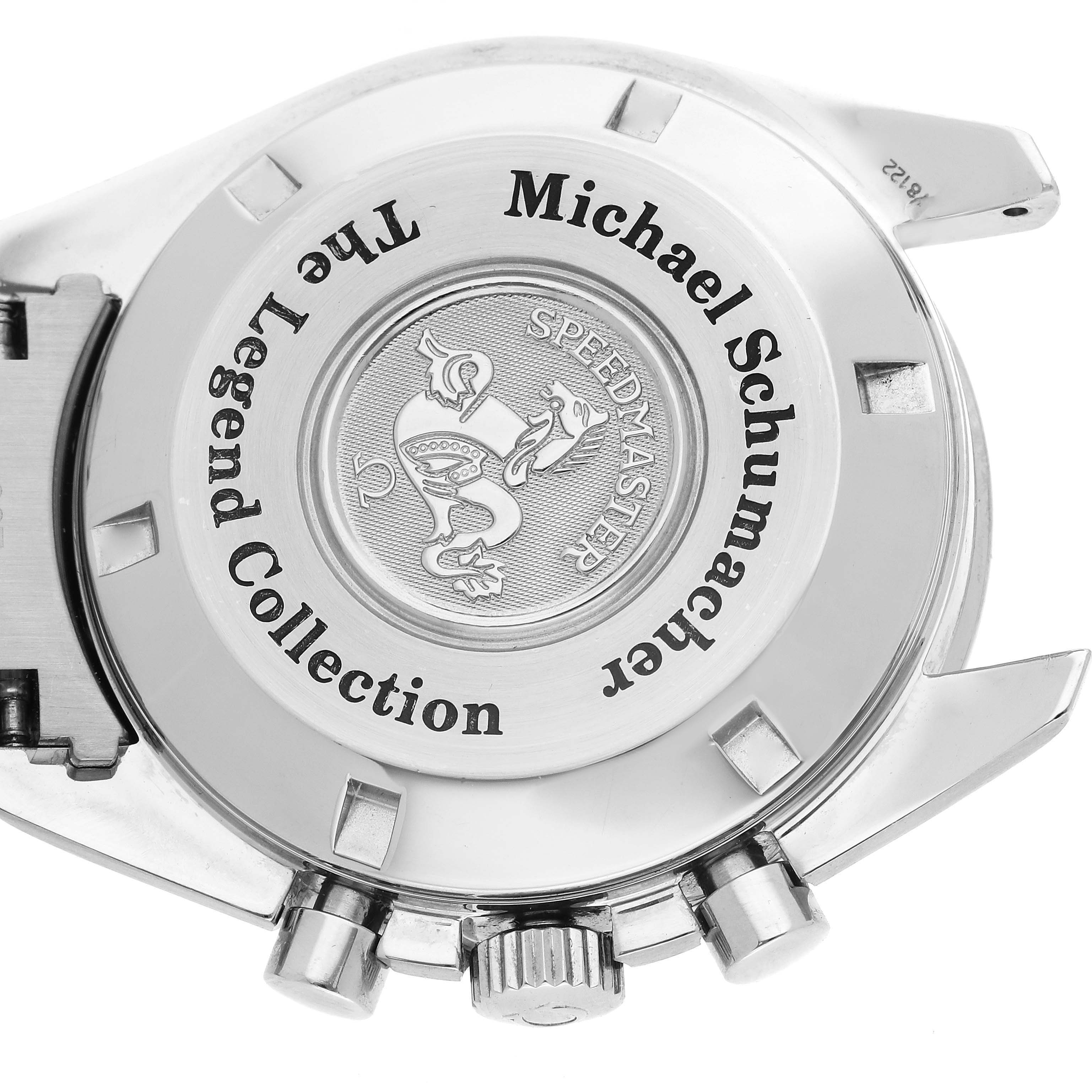 The image shows the case back of the Omega Speedmaster 3506.61.00 Men
s Stainless Steel Red Dial 3506.61.00 Men
s Stainless Steel Red Dial, highlighting the "Michael Schumacher The Legend Collection" engraving.