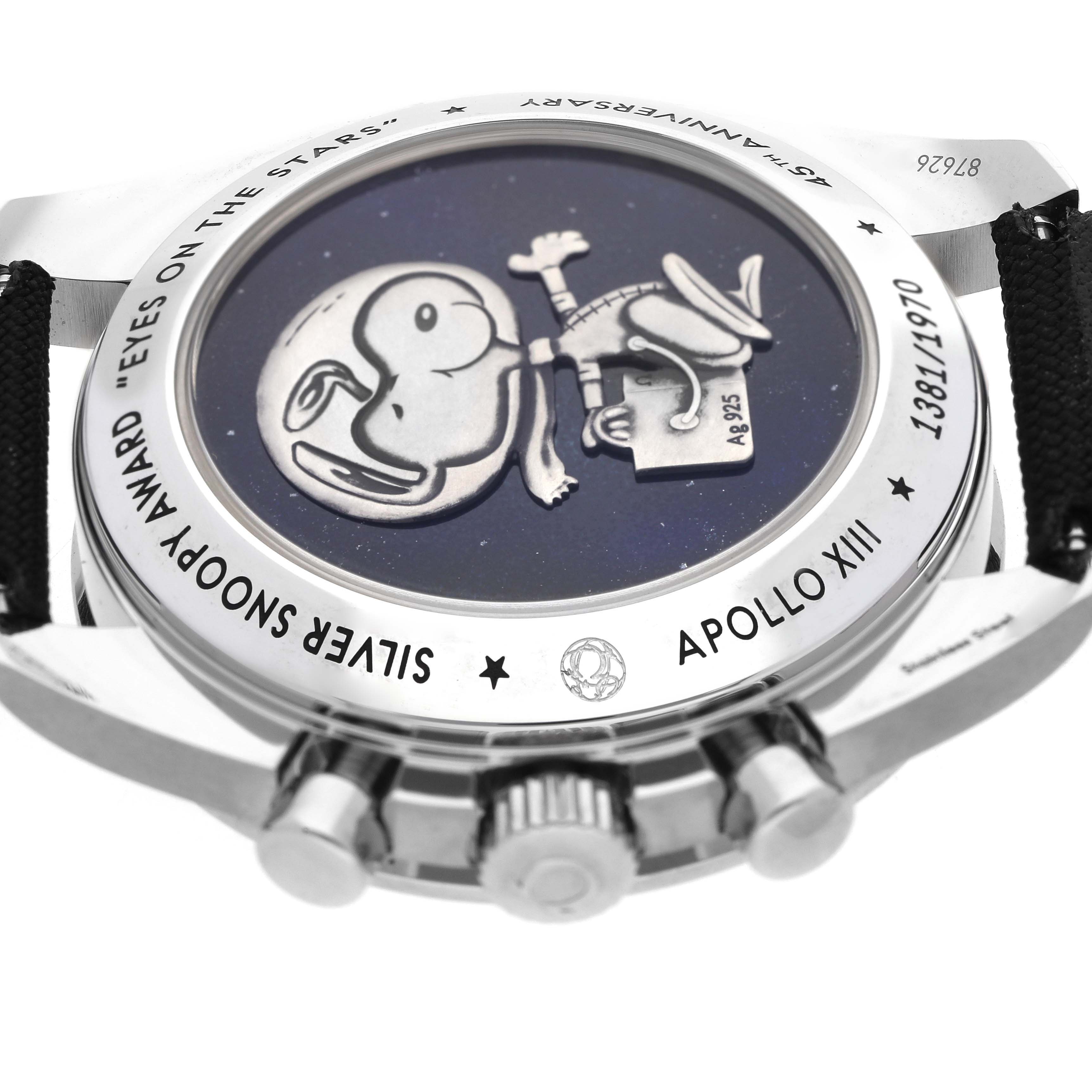 The image shows the case back of an Omega Speedmaster 311.30.42.30.04.003 Men's Stainless Steel White Dial 311.30.42.30.04.003 Men's Stainless Steel White Dial, featuring an Apollo XIII design with the Silver Snoopy Award engraving.