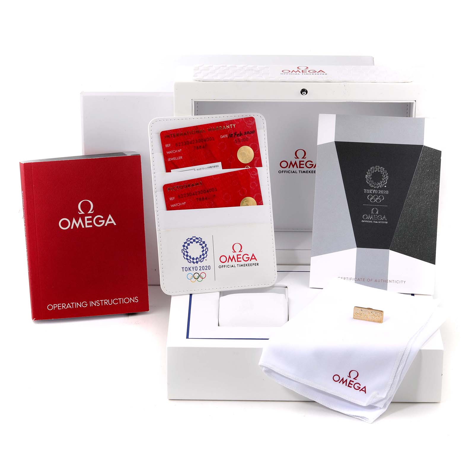The image shows the packaging, warranty cards, operating instructions, and authenticity certificate for an Omega Speedmaster 522.30.42.30.04.001 Men's Stainless Steel White Dial 522.30.42.30.04.001 Men's Stainless Steel White Dial watch.