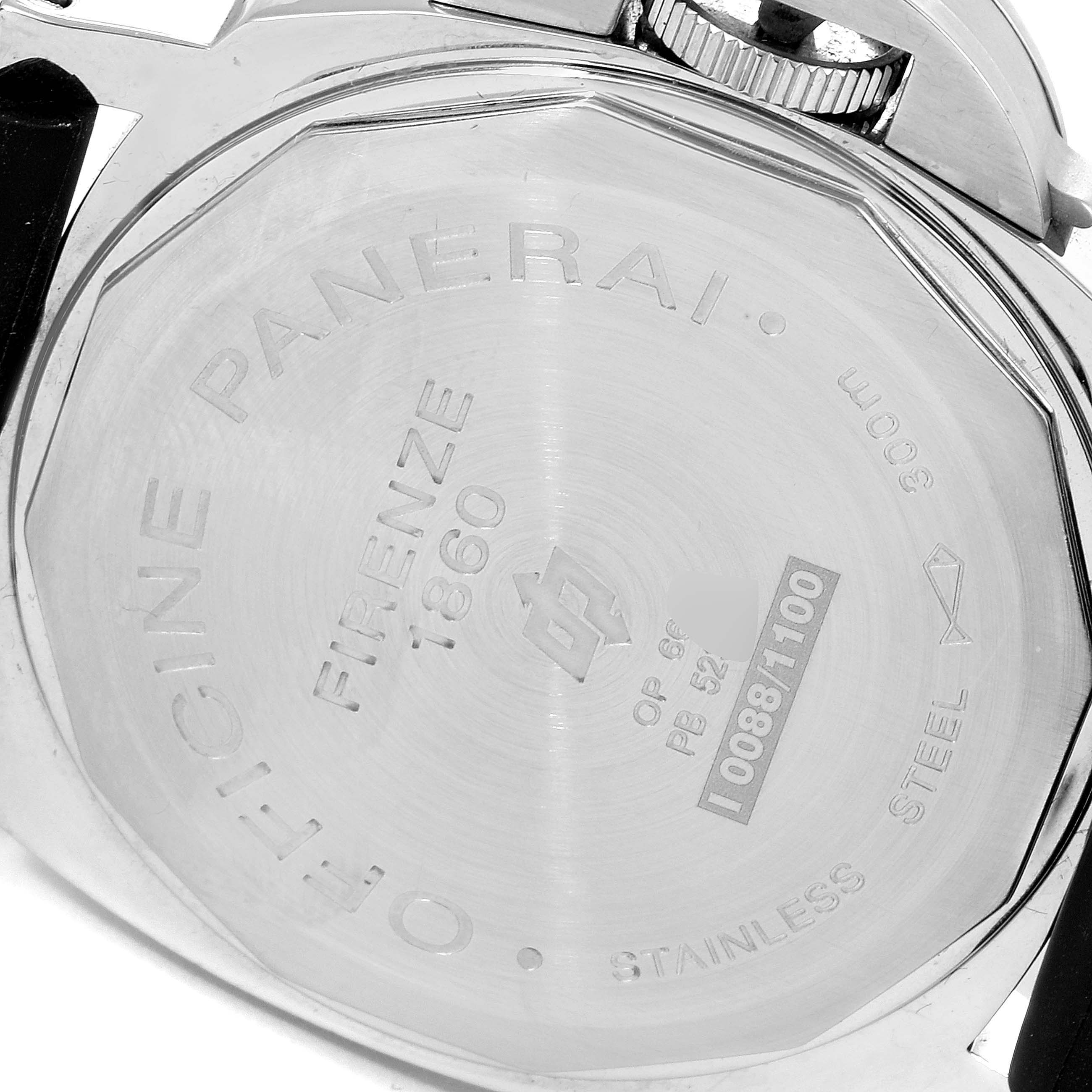 The image shows the back casing of a Luminor model by Panerai, displaying engravings and the crown guard.