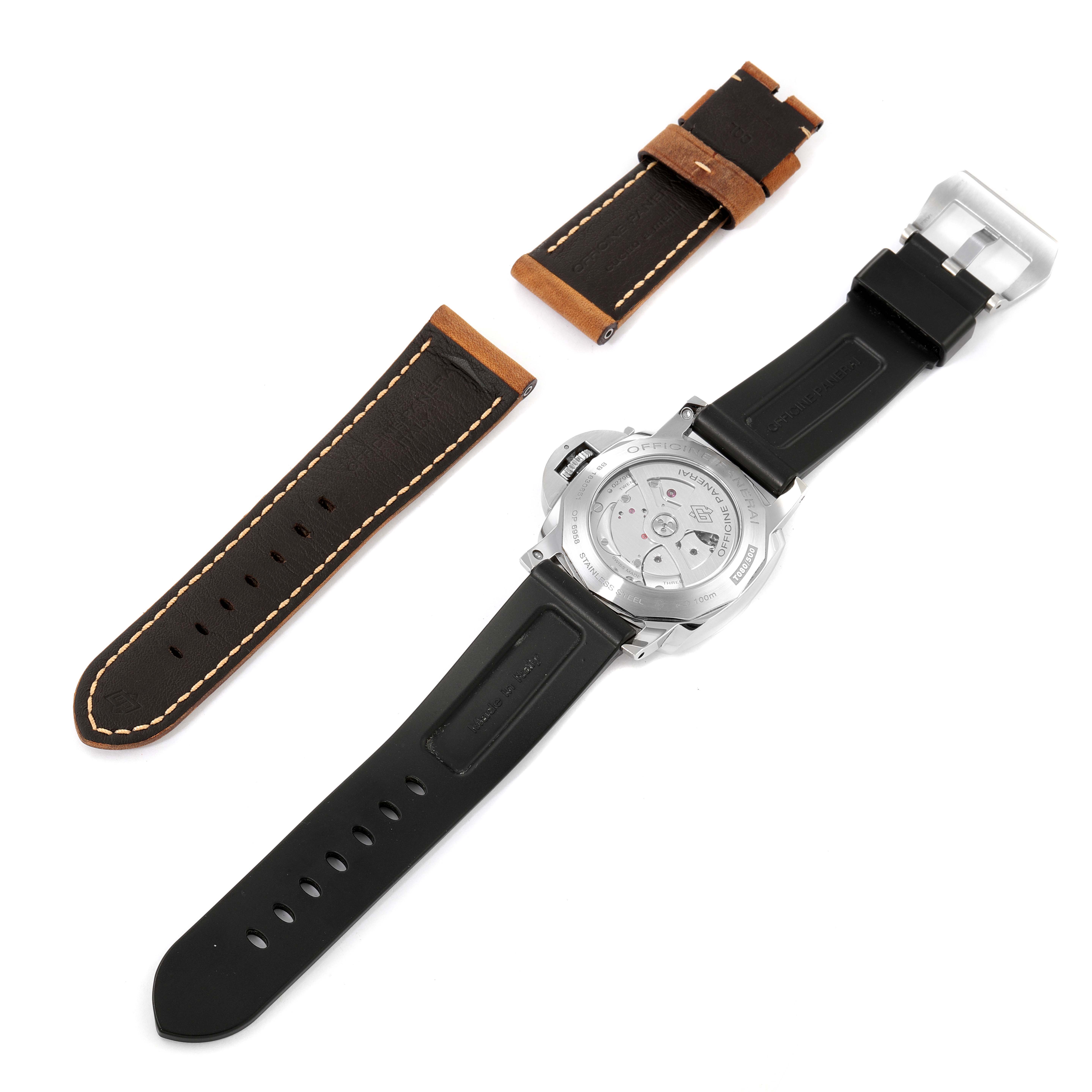 The image shows the back view of a Panerai Luminor PAM00533 Men
s Stainless Steel Black Dial PAM00533 Men
s Stainless Steel Black Dial watch with a black rubber strap and two brown leather strap pieces.