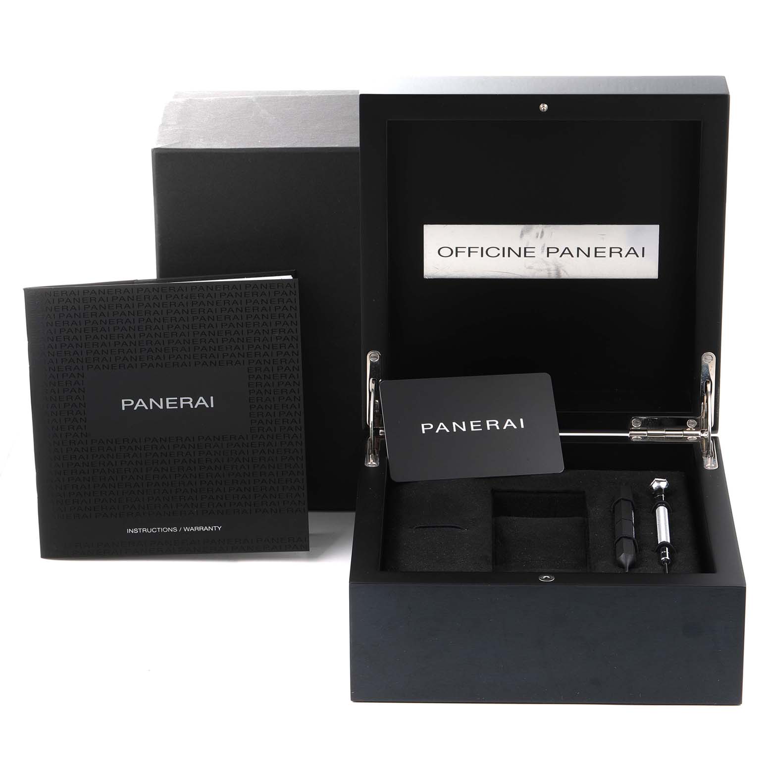 The image shows the Panerai Luminor PAM00986 Men's Stainless Steel Blue Dial PAM00986 Men's Stainless Steel Blue Dial watch box and its contents, including documentation and tools.