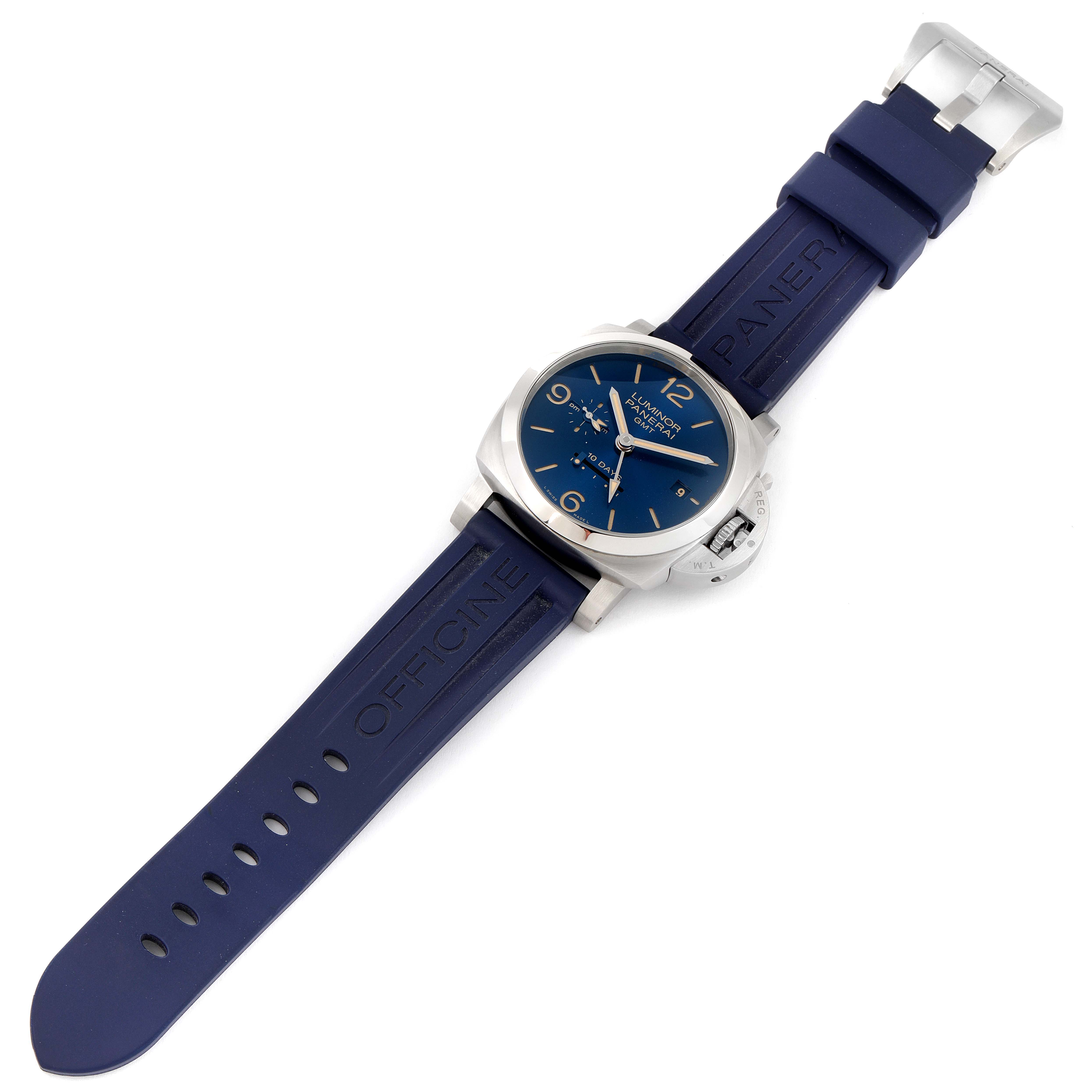 The Panerai Luminor PAM00986 Men's Stainless Steel Blue Dial PAM00986 Men's Stainless Steel Blue Dial watch is shown from a top-down angle, displaying its blue dial, stainless steel case, and blue rubber strap.