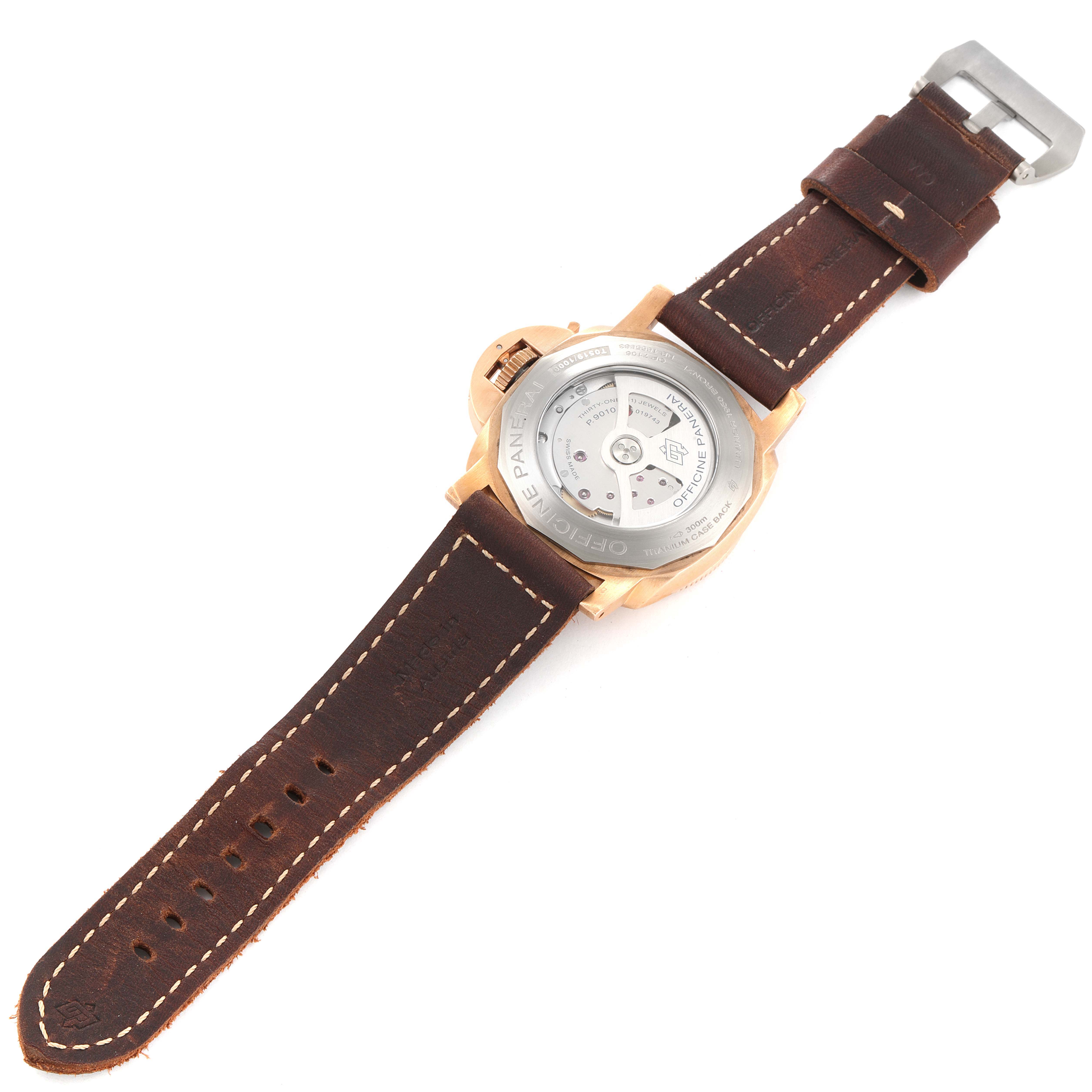 The image shows the back view of a Panerai Submersible PAM00671 Men's Bronze Blue Dial PAM00671 Men's Bronze Blue Dial watch with its brown leather strap.