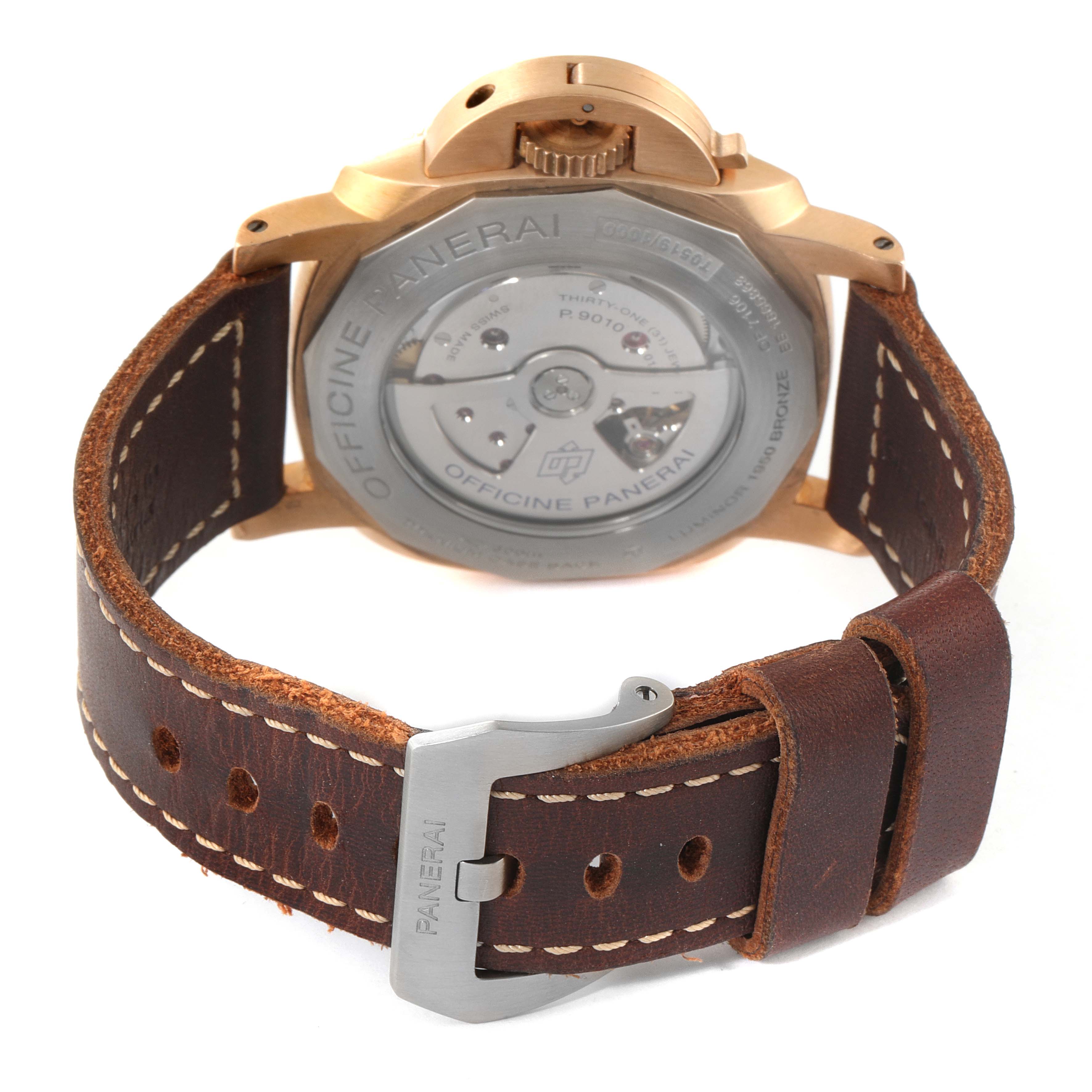 The image shows the back view of a Panerai Submersible PAM00671 Men's Bronze Blue Dial PAM00671 Men's Bronze Blue Dial watch, focusing on the case back and brown leather strap with buckle.