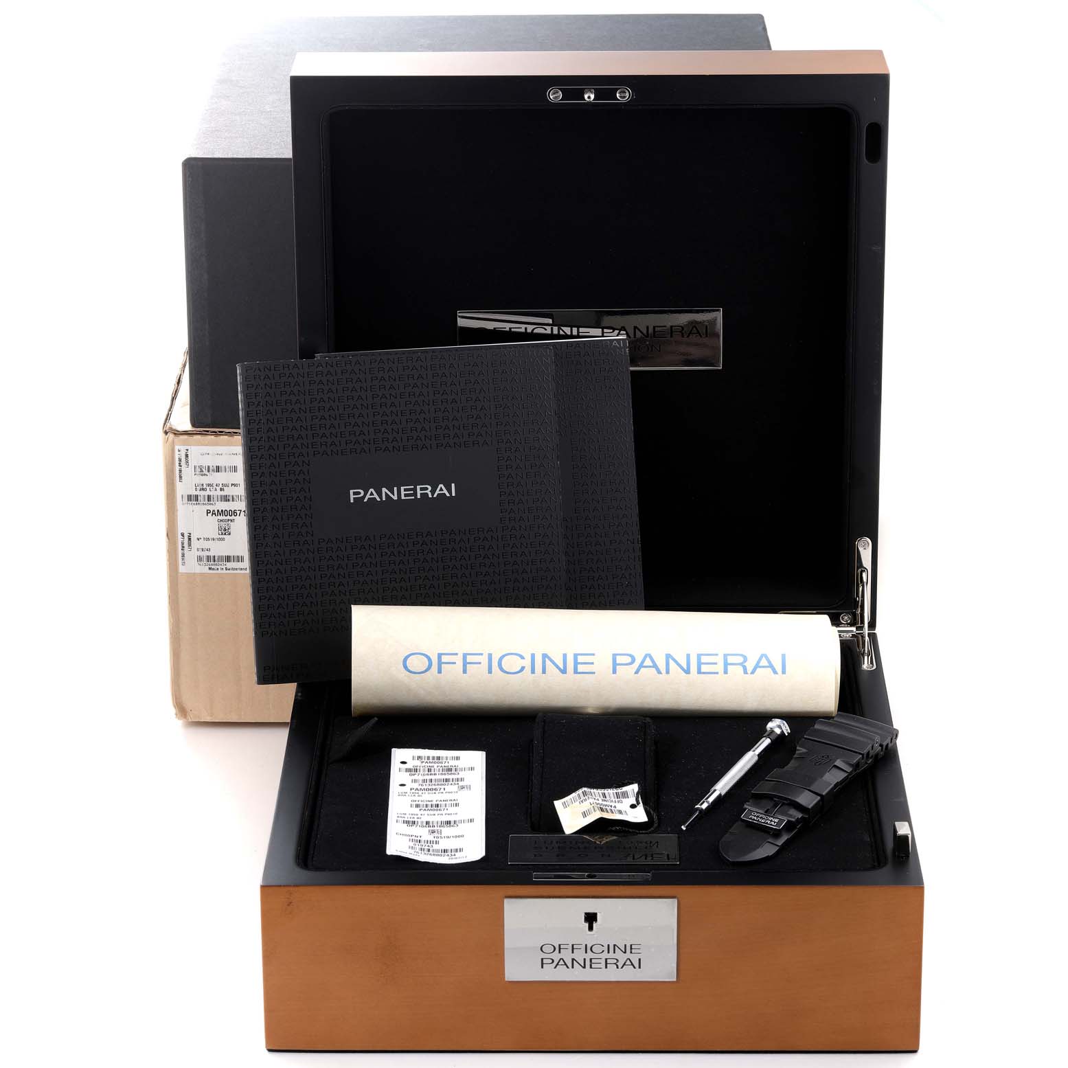 The image shows an open box for a Panerai Submersible PAM00671 Men's Bronze Blue Dial PAM00671 Men's Bronze Blue Dial watch, including manuals, tools, and possibly a watch strap.