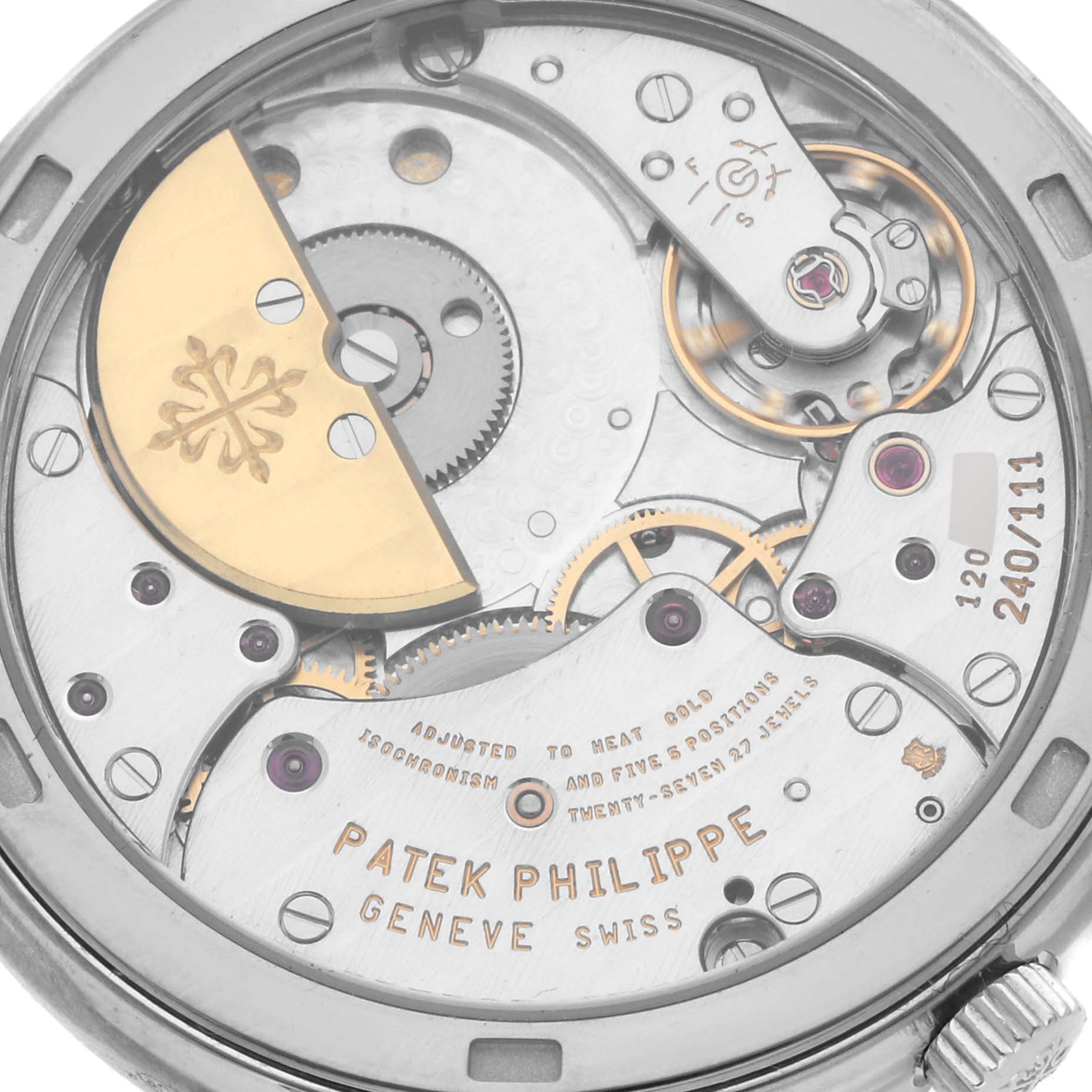 The image shows the movement of the Patek Philippe Calatrava 5120G Men's White Gold White Dial 5120G Men's White Gold White Dial watch from the back, highlighting gears and the rotor.