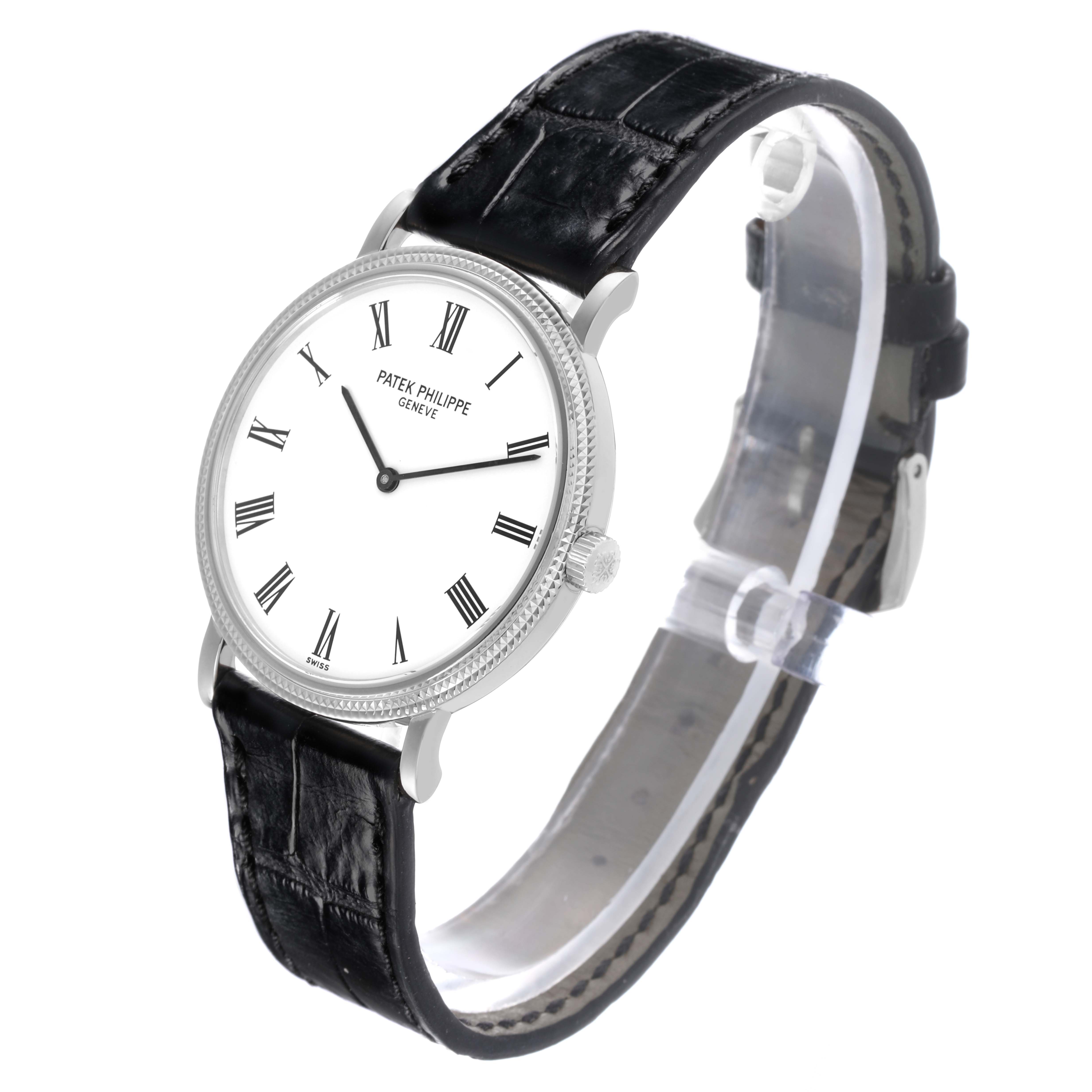 The Patek Philippe Calatrava 5120G Men's White Gold White Dial 5120G Men's White Gold White Dial watch is shown from a three-quarter angle, highlighting its face, bezel, and leather strap.