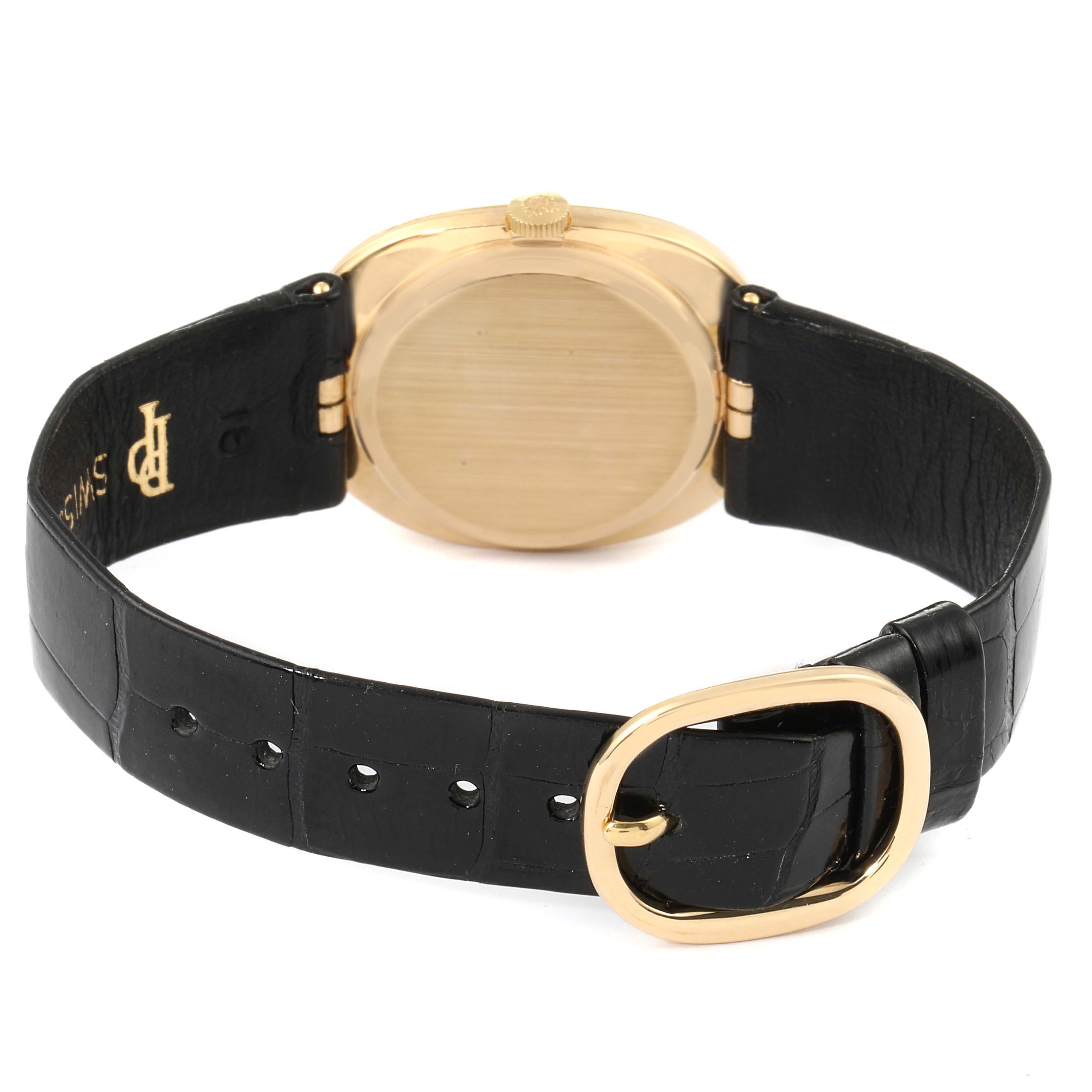 The image shows the back and black leather strap of the Patek Philippe Golden Ellipse 3848 Men's Yellow Gold Blue Dial 3848 Men's Yellow Gold Blue Dial watch.