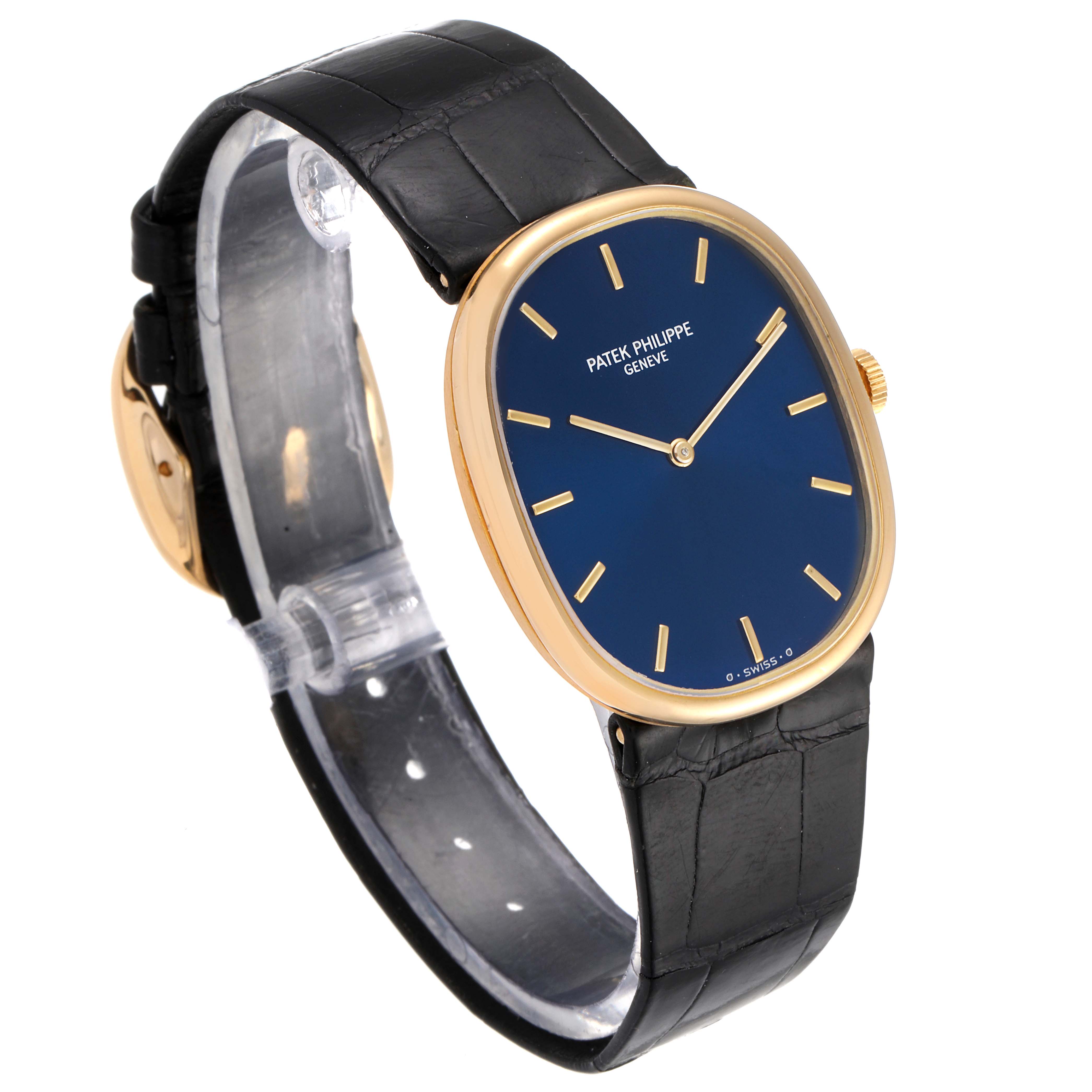 The image shows a side angle of the Patek Philippe Golden Ellipse 3848 Men's Yellow Gold Blue Dial 3848 Men's Yellow Gold Blue Dial watch, highlighting its blue dial, gold case, and black leather strap.