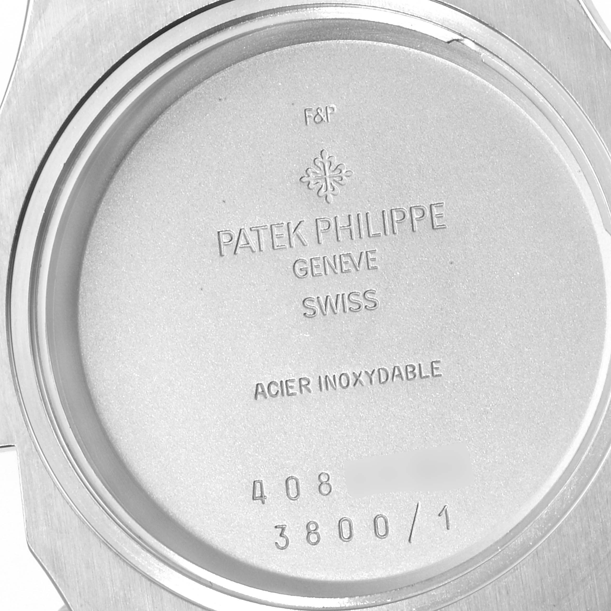 The image shows the back case of a Patek Philippe Nautilus 3800/1 Men's Stainless Steel Black Dial 3800/1 Men's Stainless Steel Black Dial watch with model details engraved.