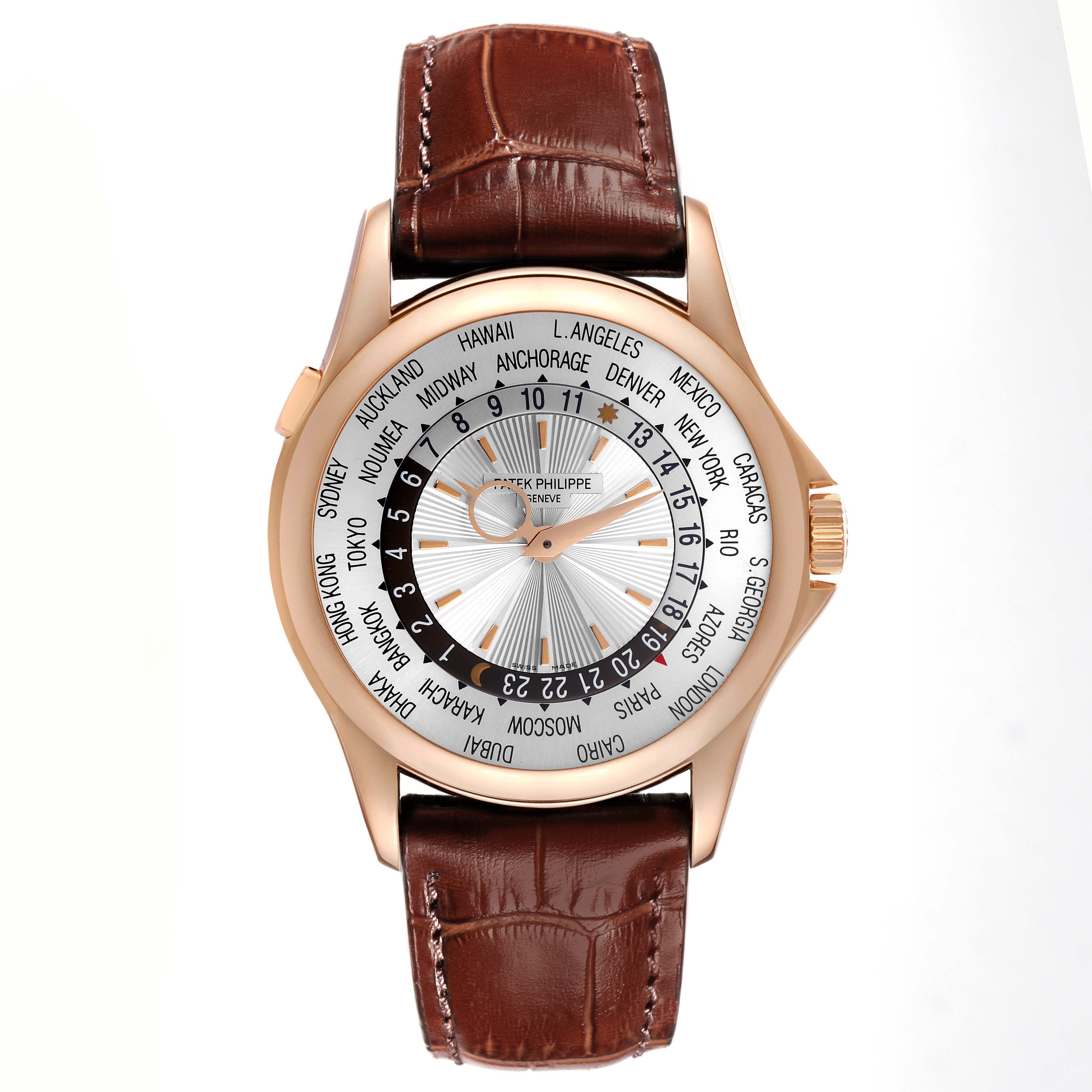 The Patek Philippe Complications 5130R-018 Men
s Rose Gold Silver Dial 5130R-018 Men
s Rose Gold Silver Dial watch is shown from a top view, highlighting its world time dial and brown leather strap.