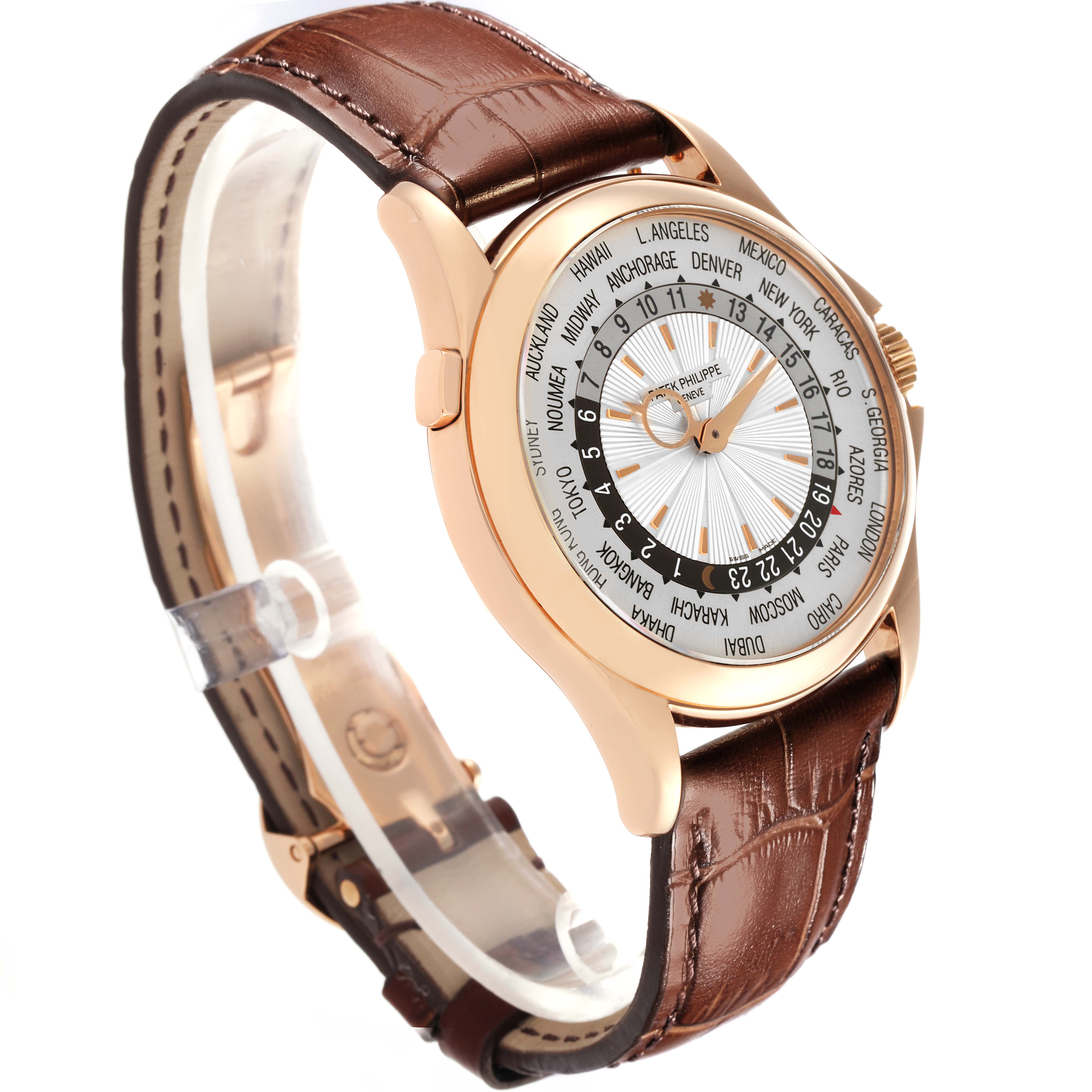 The image shows a Patek Philippe Complications 5130R-018 Men
s Rose Gold Silver Dial 5130R-018 Men
s Rose Gold Silver Dial watch at a three-quarter angle, highlighting the dial, case, and brown leather strap.