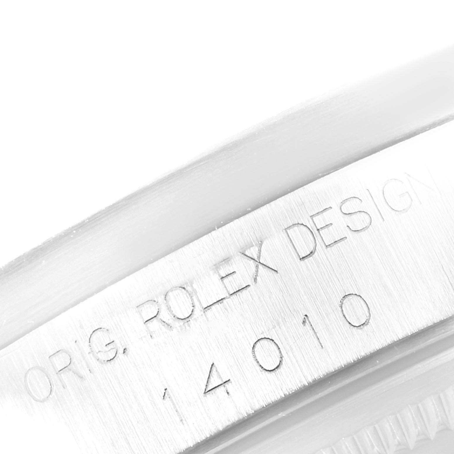 The image shows a close-up angle of the casing with engraved text of the Rolex Air-King 14010 Men's Stainless Steel Black Dial 14010 Men's Stainless Steel Black Dial model.