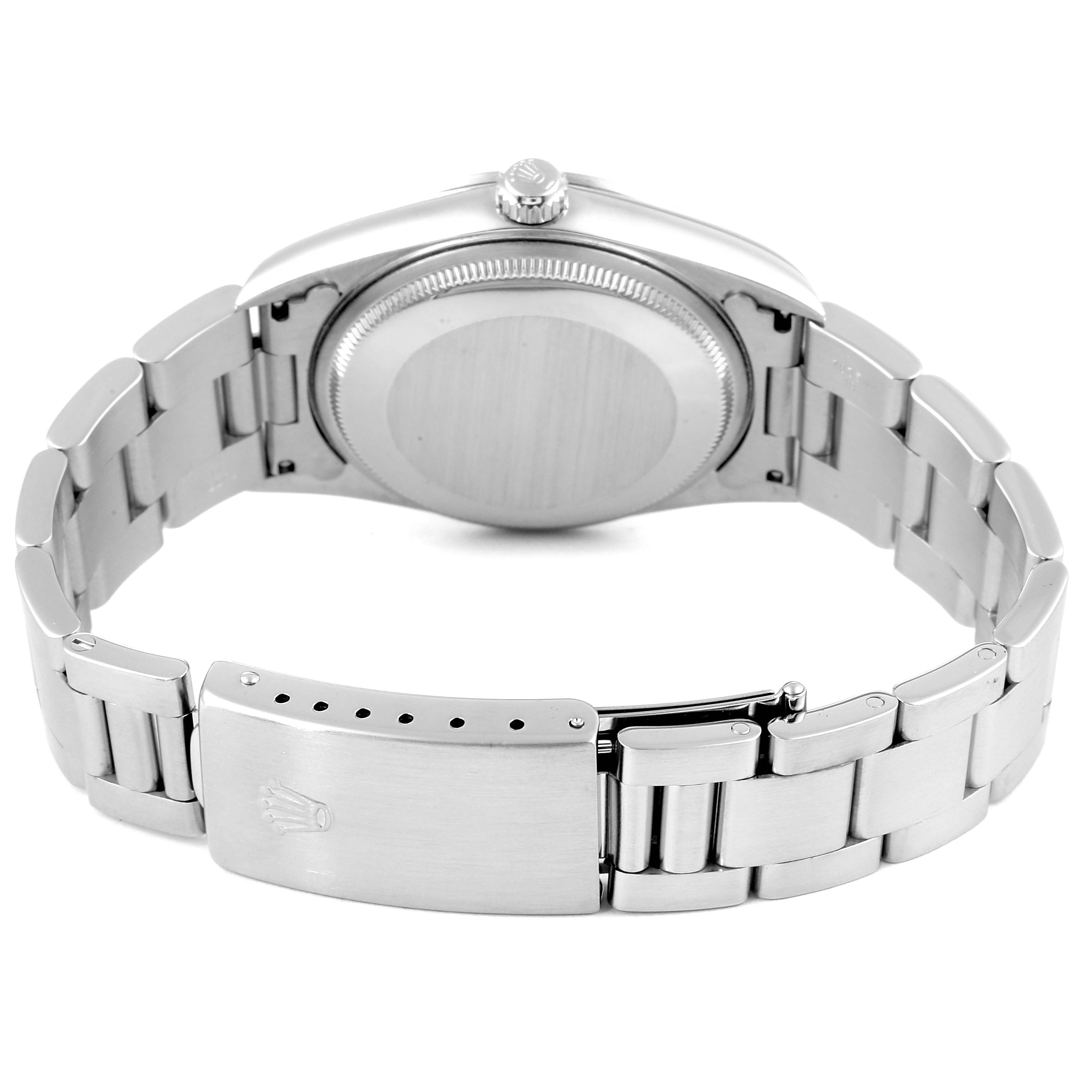 This image shows the back of a Rolex Air-King 14000 Men's Stainless Steel Blue Dial 14000 Men's Stainless Steel Blue Dial watch, highlighting the bracelet clasp and case back.