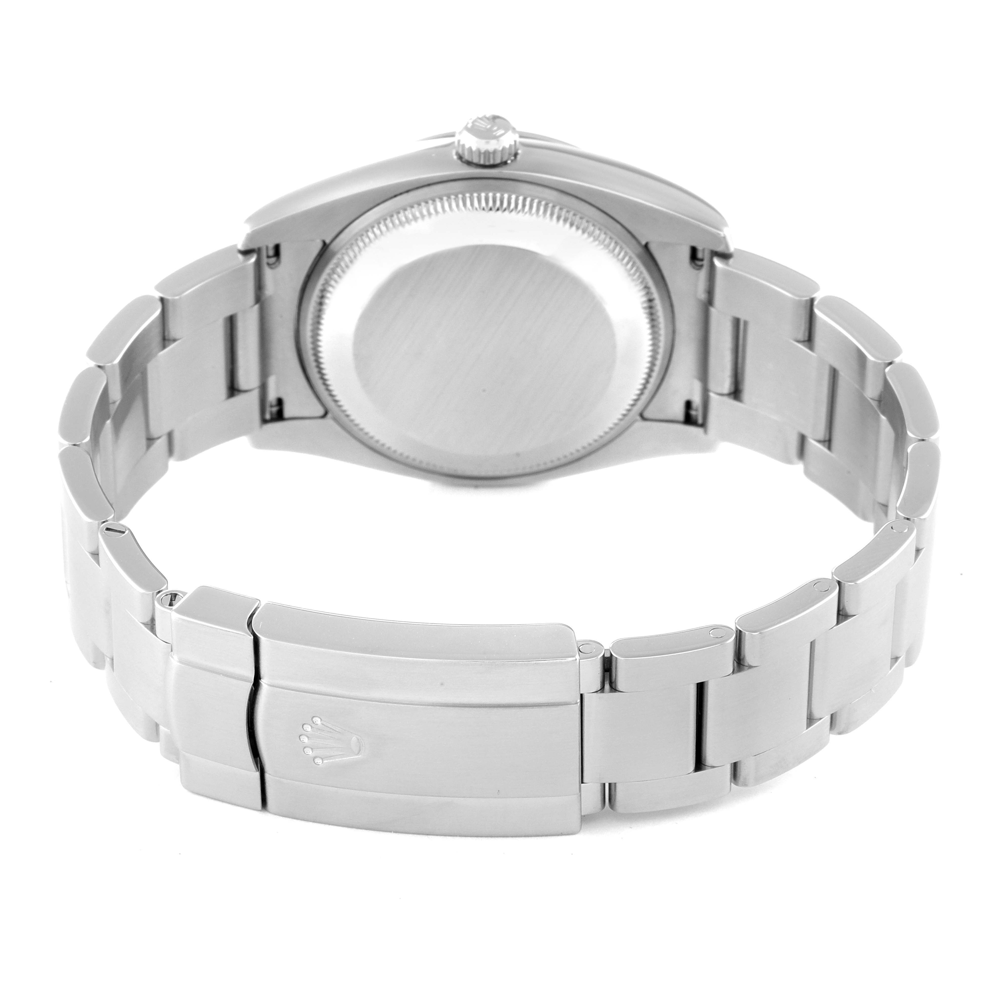 This image shows the back and bracelet of a Rolex Air-King 114200 Men's Stainless Steel Blue Dial 114200 Men's Stainless Steel Blue Dial watch, highlighting the case back and the clasp with the Rolex logo.