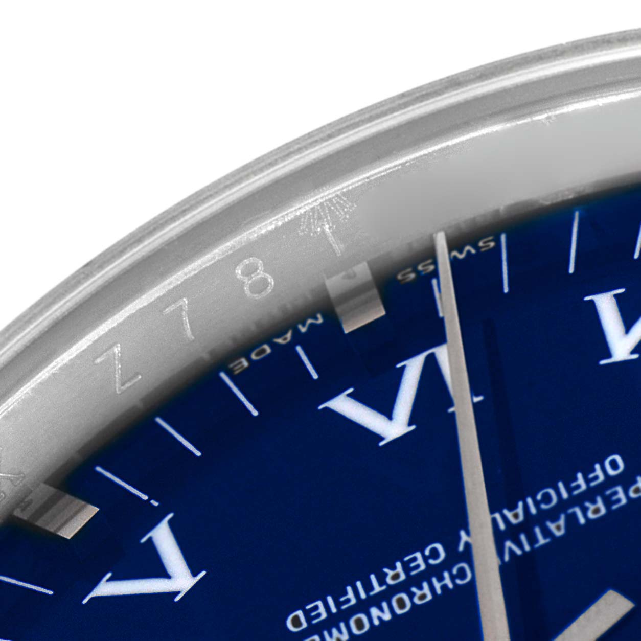 This close-up image shows the dial and bezel of a Rolex Air-King 114200 Men's Stainless Steel Blue Dial 114200 Men's Stainless Steel Blue Dial watch.