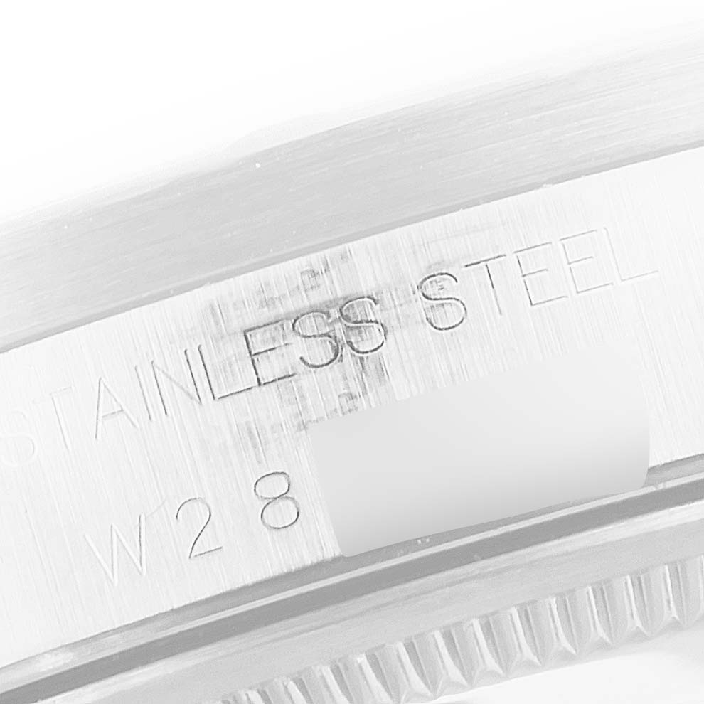 The image shows a close-up angle of the case side detailing the stainless steel material of the Rolex Air-King 14010 Men's Stainless Steel Blue Dial 14010 Men's Stainless Steel Blue Dial watch.
