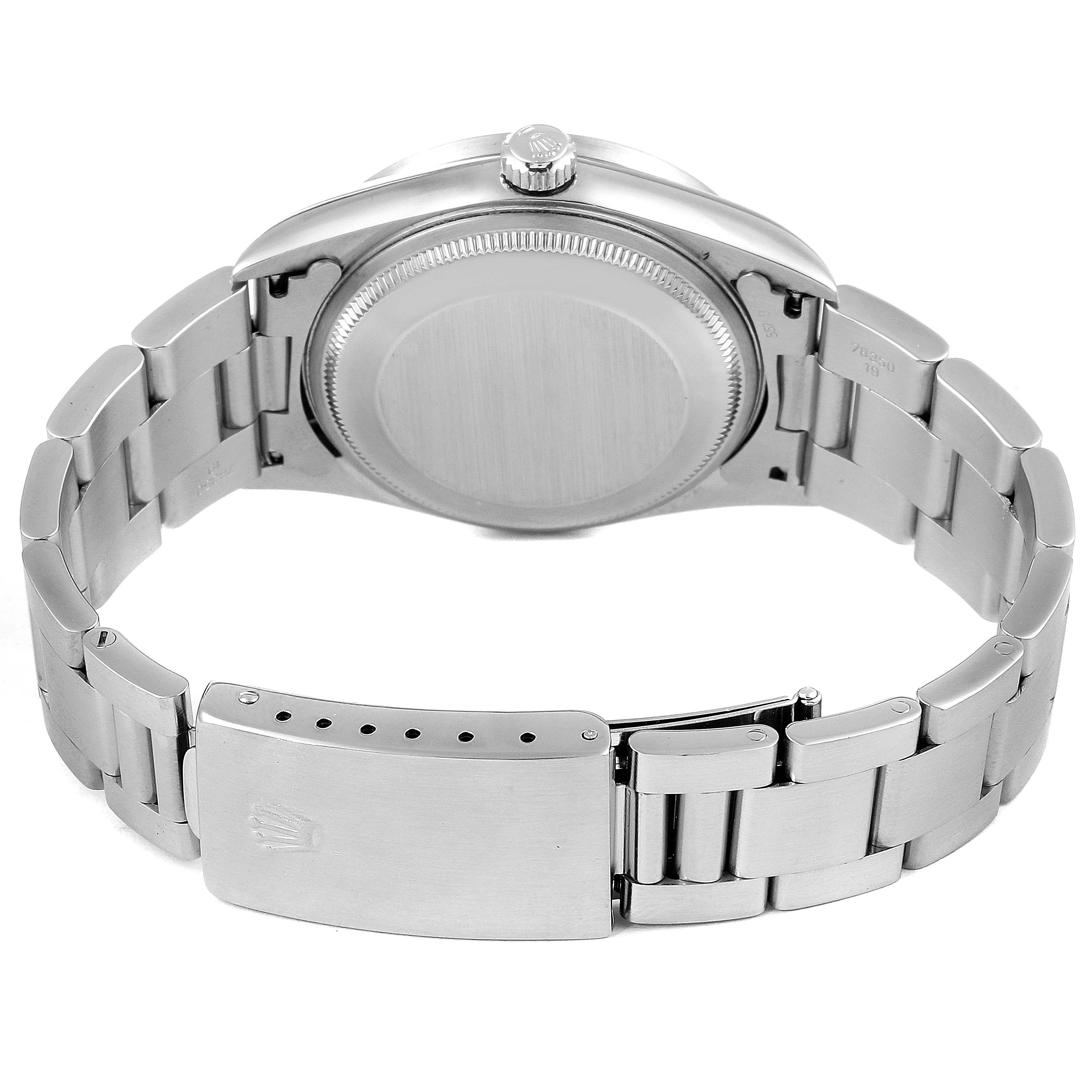 This image shows the back case and clasp of a Rolex Air-King 14010 Men's Stainless Steel Blue Dial 14010 Men's Stainless Steel Blue Dial watch viewed from the rear.