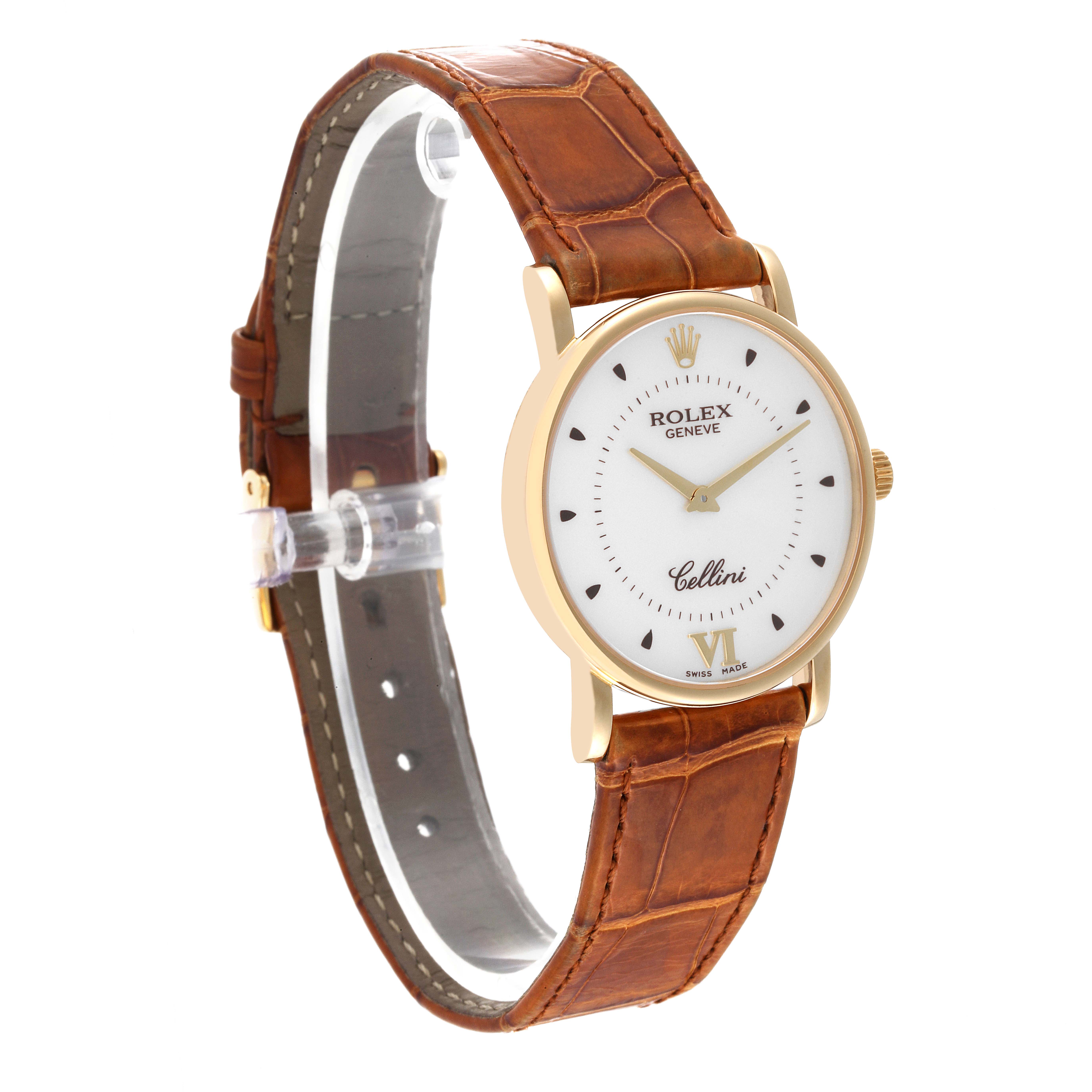 The Rolex Cellini 5115 Men's Yellow Gold Silver Dial 5115 Men's Yellow Gold Silver Dial watch is shown at a slight angle, displaying its face, dial, crown, and brown leather strap.