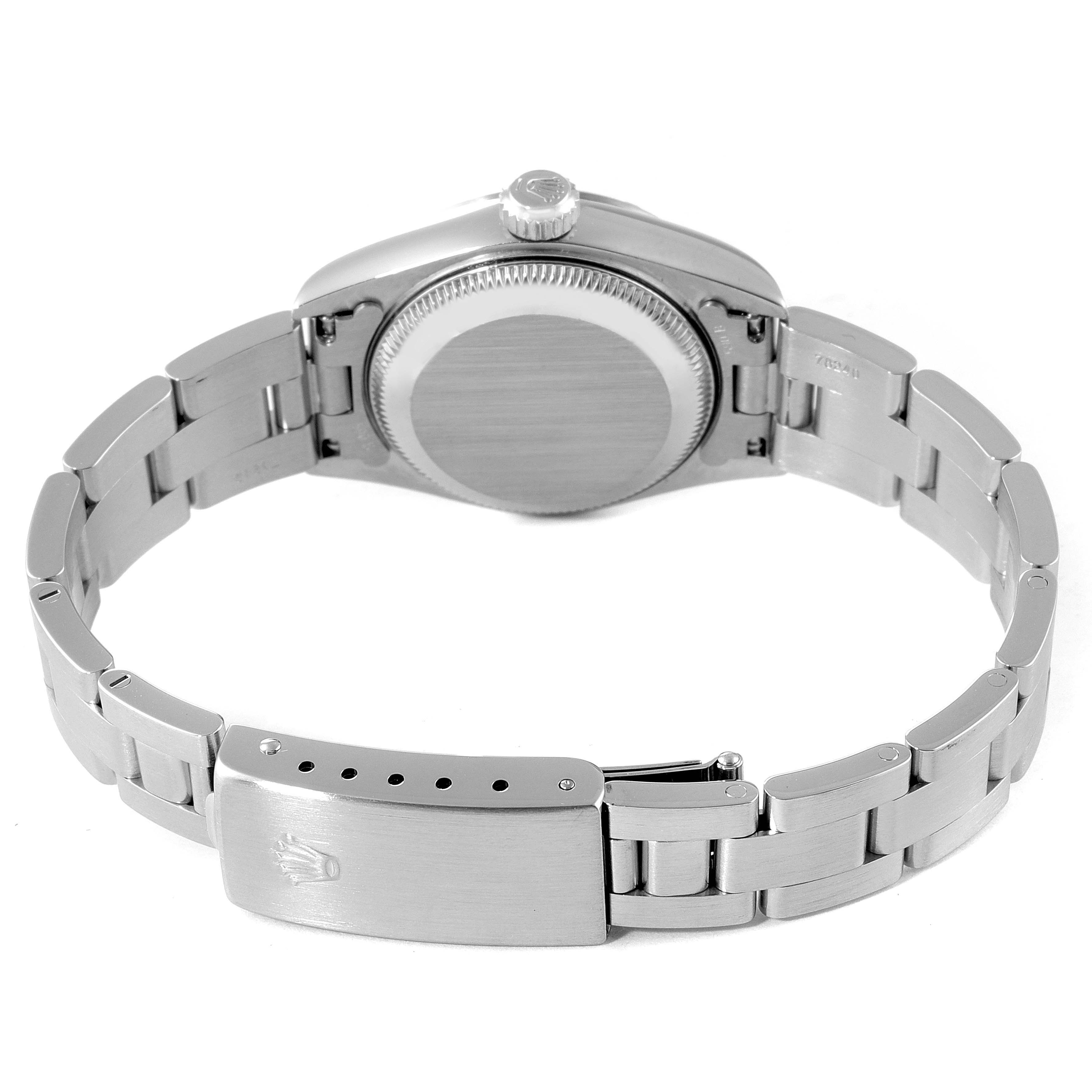 The image shows the back view of a Rolex Date 79190 Women's Stainless Steel Black Dial 79190 Women's Stainless Steel Black Dial model watch, highlighting the case back, crown, and bracelet with clasp.