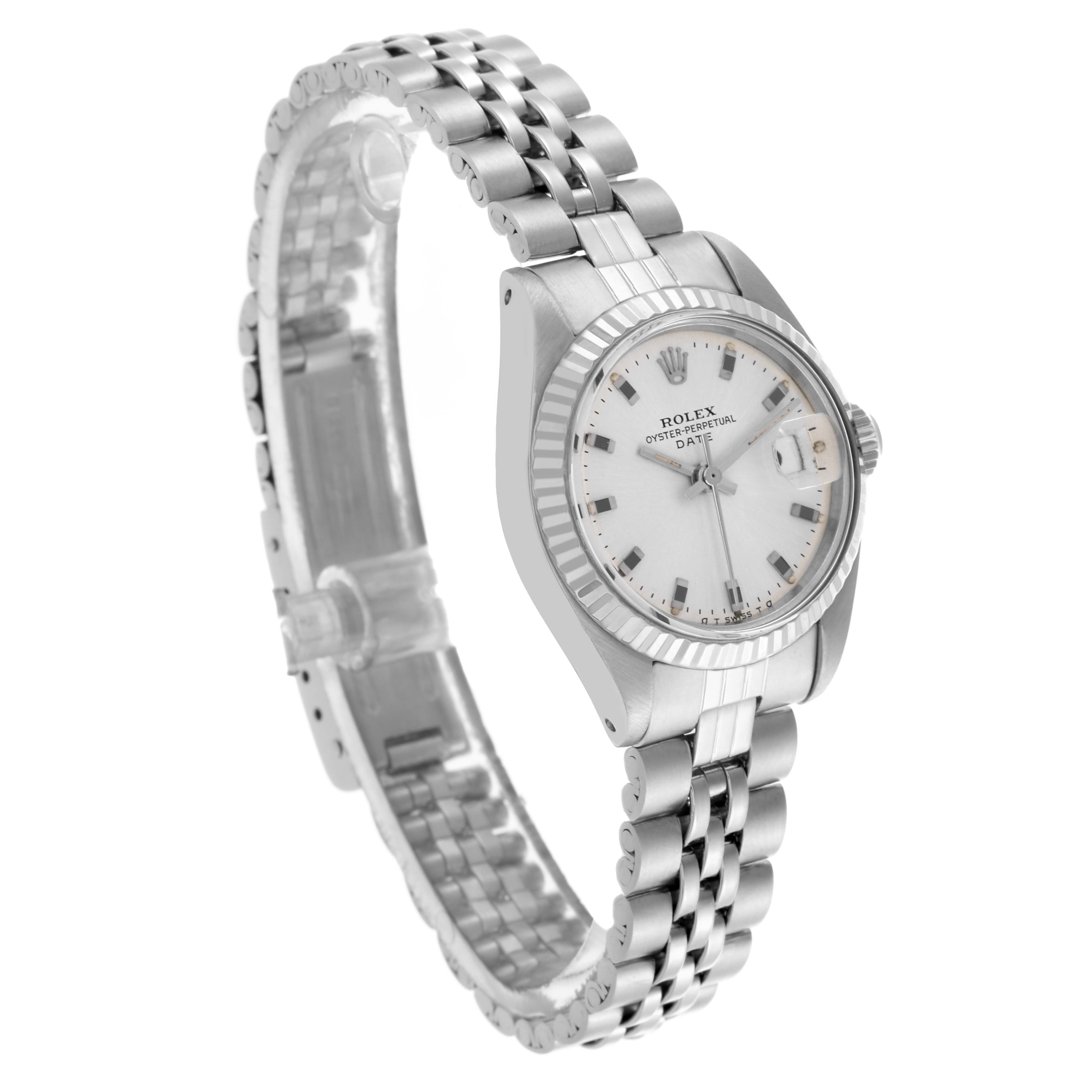 The Rolex Date 6917 Women's Stainless Steel Silver Dial 6917 Women's Stainless Steel Silver Dial model is shown at an angled side view, displaying the dial, bezel, case, and partially open bracelet.