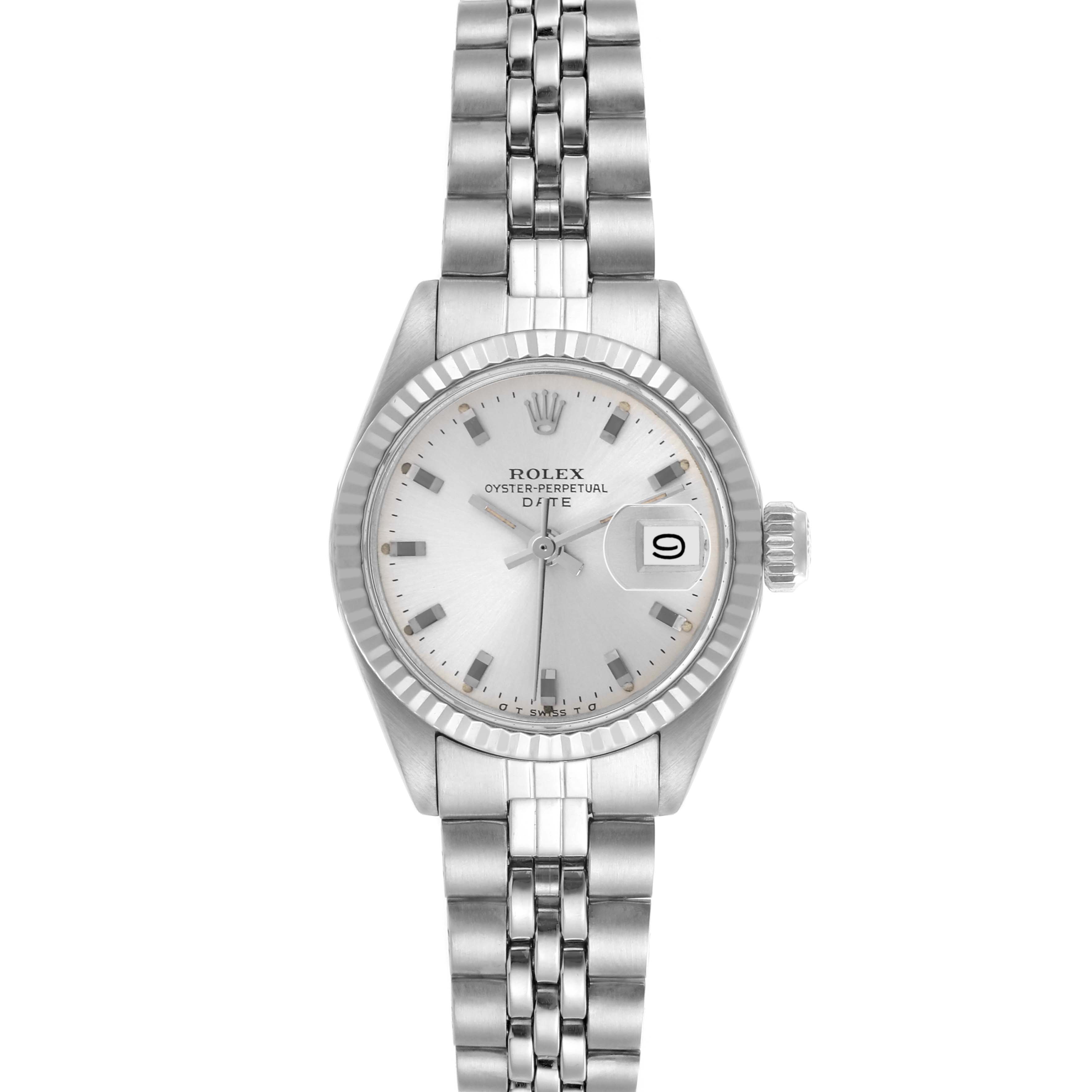 The Rolex Date 6917 Women's Stainless Steel Silver Dial 6917 Women's Stainless Steel Silver Dial watch is shown from a front angle, highlighting the dial, fluted bezel, bracelet, and cyclops lens over the date.