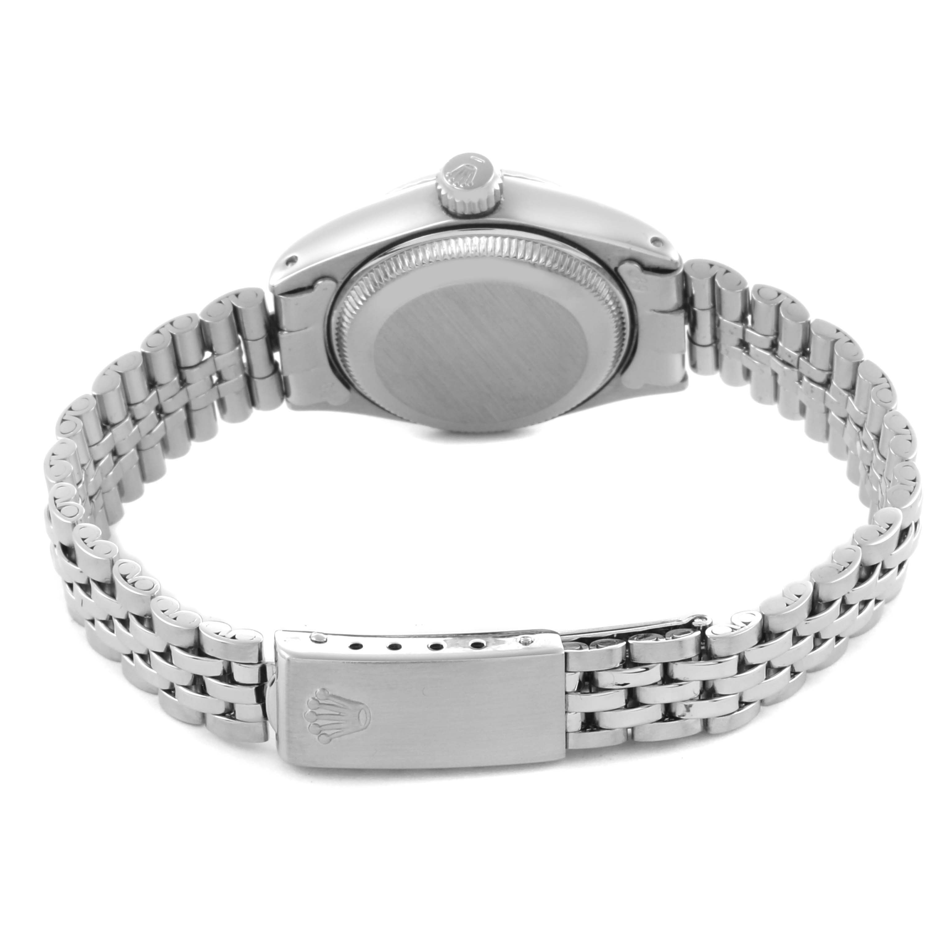The image shows the back of a Rolex Date 6917 Women's Stainless Steel Silver Dial 6917 Women's Stainless Steel Silver Dial watch, highlighting the case back, bracelet, and clasp from a rear angle.