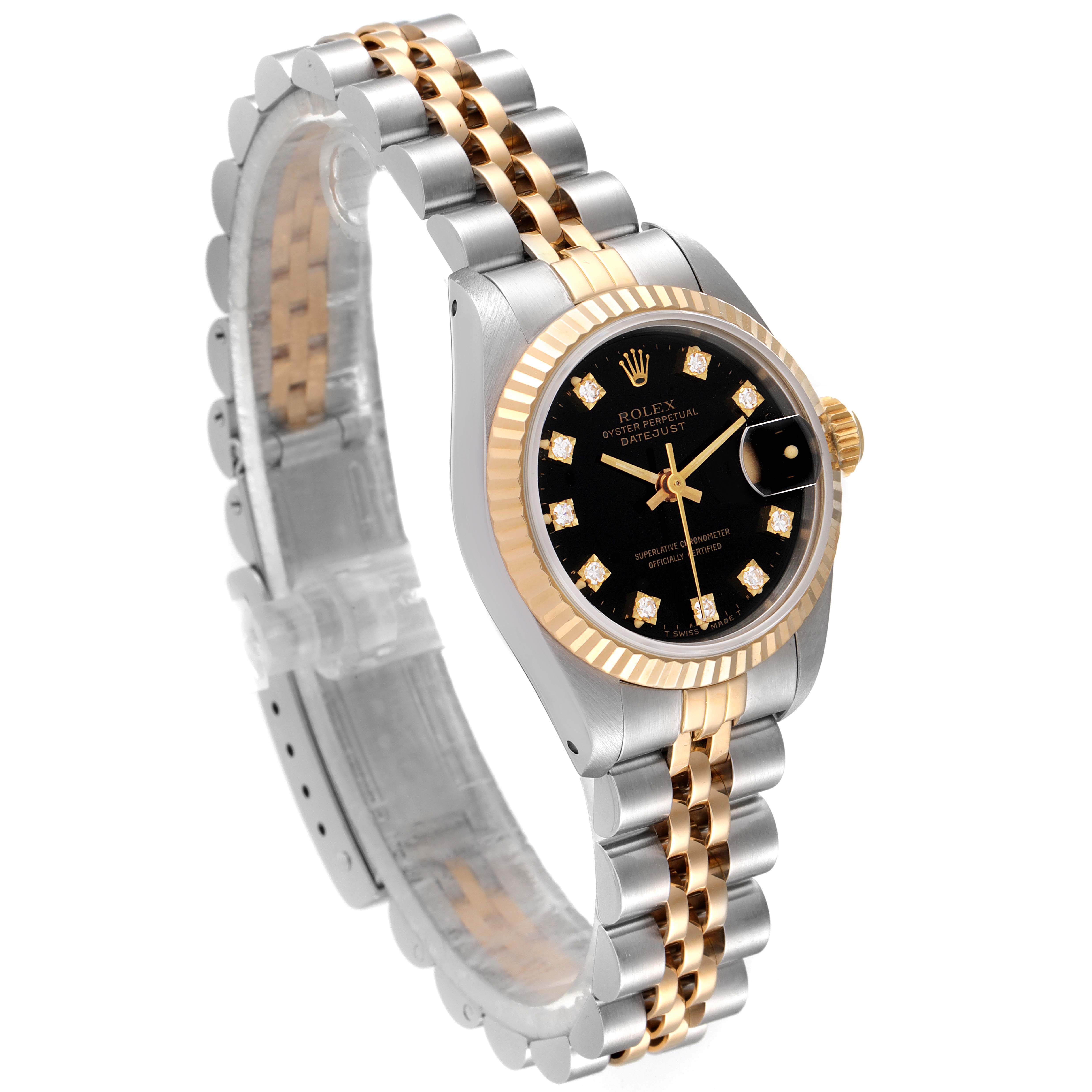 The image shows a Rolex Datejust 69173 Women's Steel and Gold (two tone) Black Dial 69173 Women's Steel and Gold (two tone) Black Dial watch angled to display its black dial, gold fluted bezel, and two-tone Jubilee bracelet.