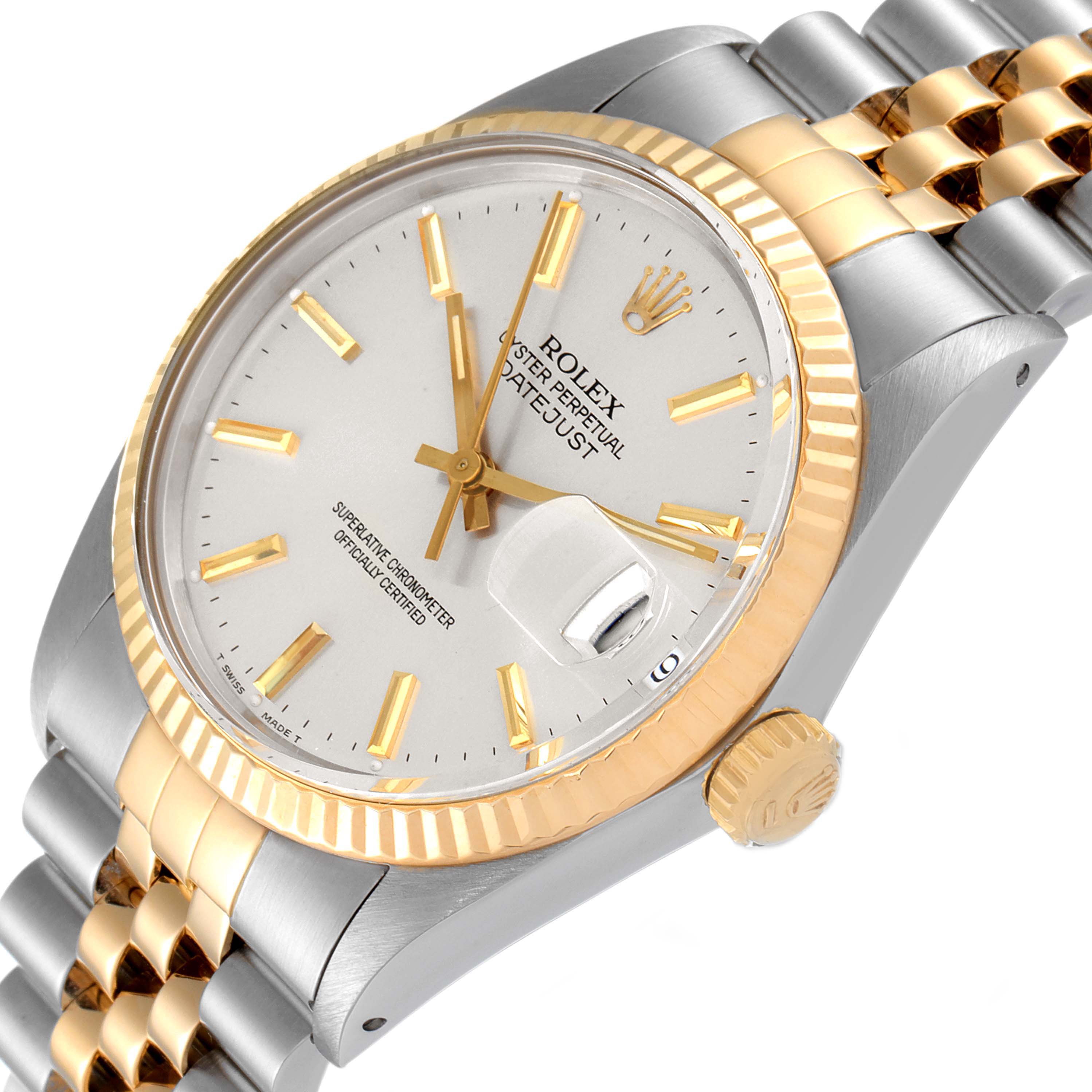 This image shows a close-up angle of the Rolex Vintage Collection 16013 Men's Steel and Gold (two tone) Silver Dial 16013 Men's Steel and Gold (two tone) Silver Dial Datejust, highlighting the dial, bezel, crown, and bracelet.