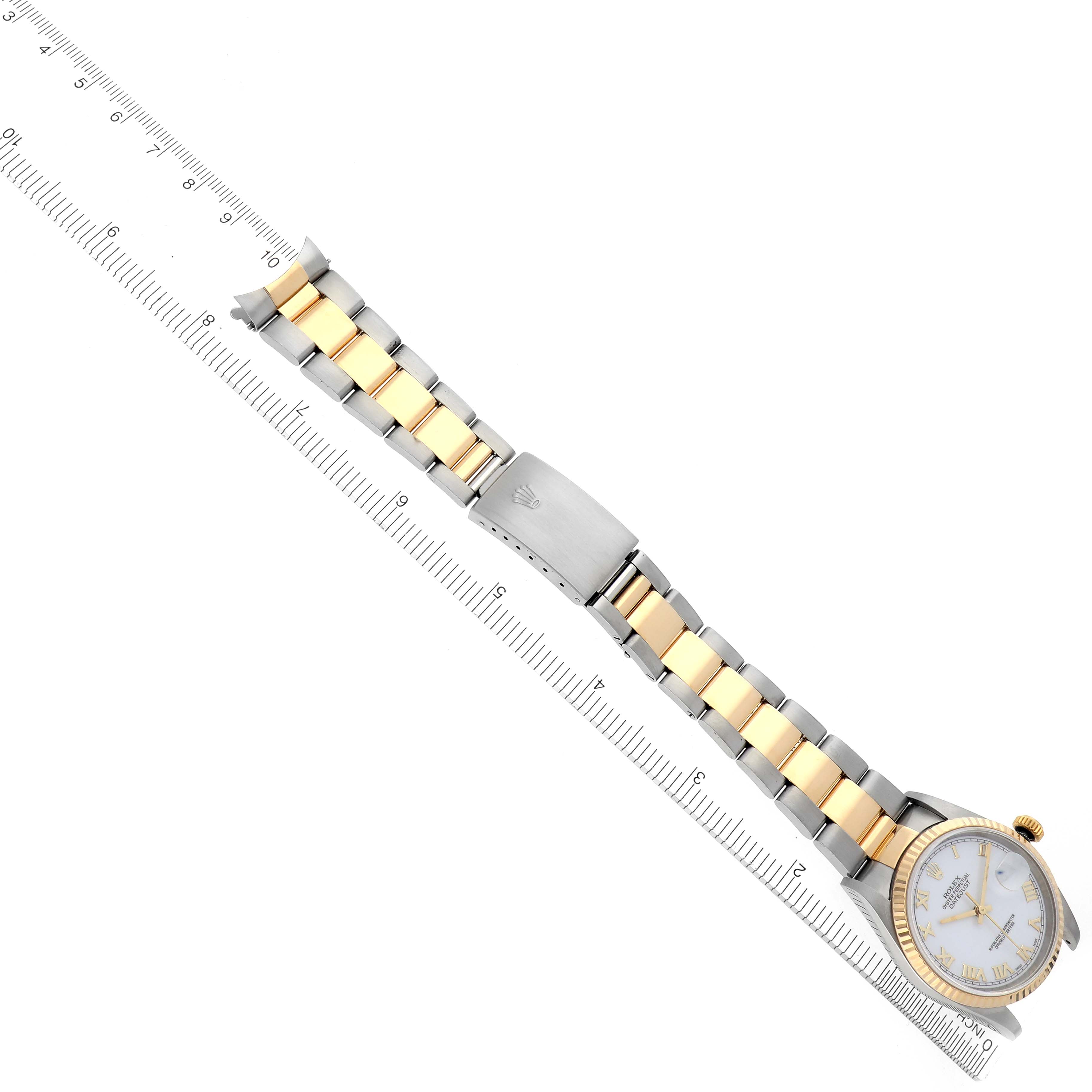 The Rolex Datejust 16233 Men's Steel and Gold (two tone) White Dial 16233 Men's Steel and Gold (two tone) White Dial watch is shown from a top-down angle, displaying its face, bezel, and two-tone bracelet with a clasp.