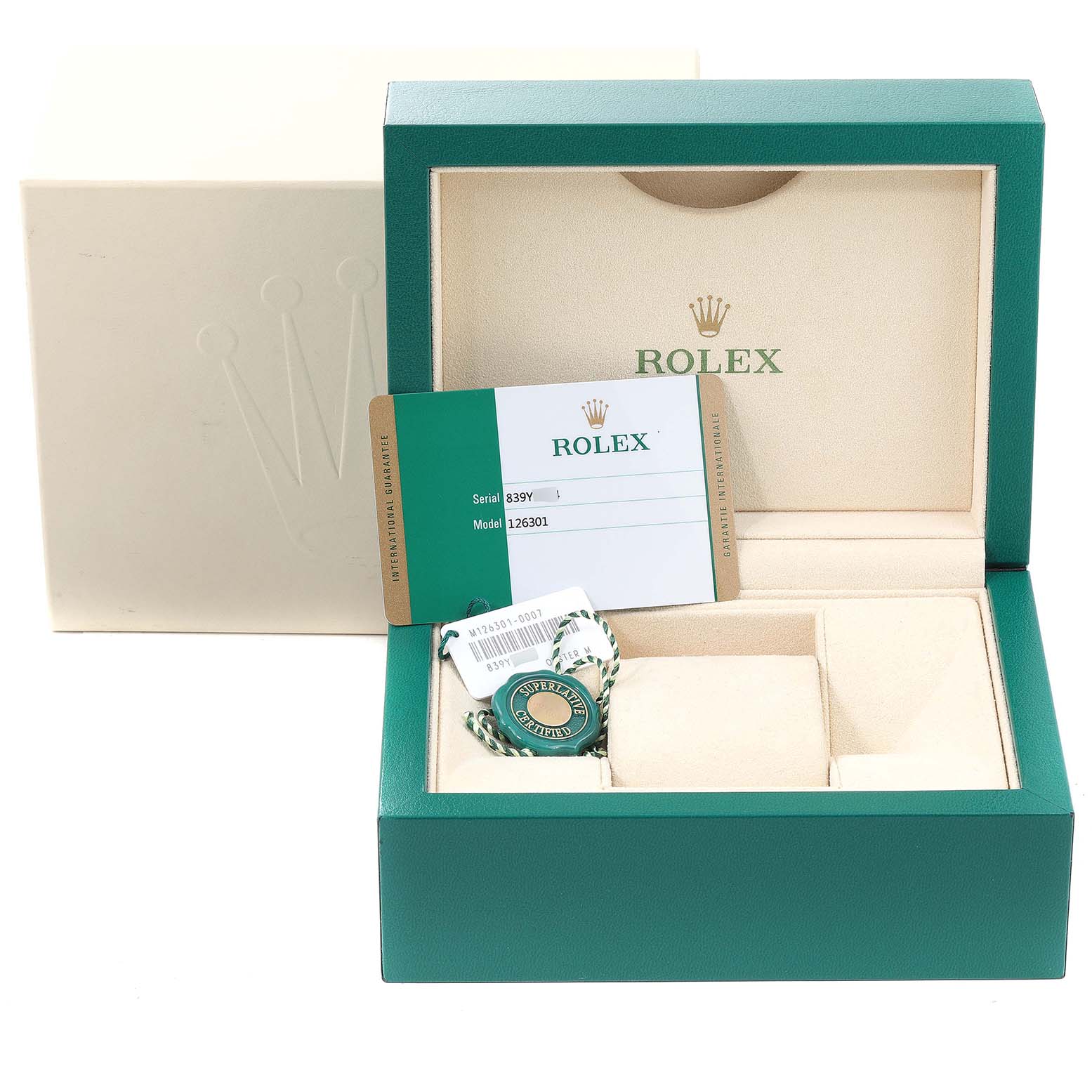 The image shows the packaging, tags, and warranty card of a Datejust 41 Rolex watch from a front angle.