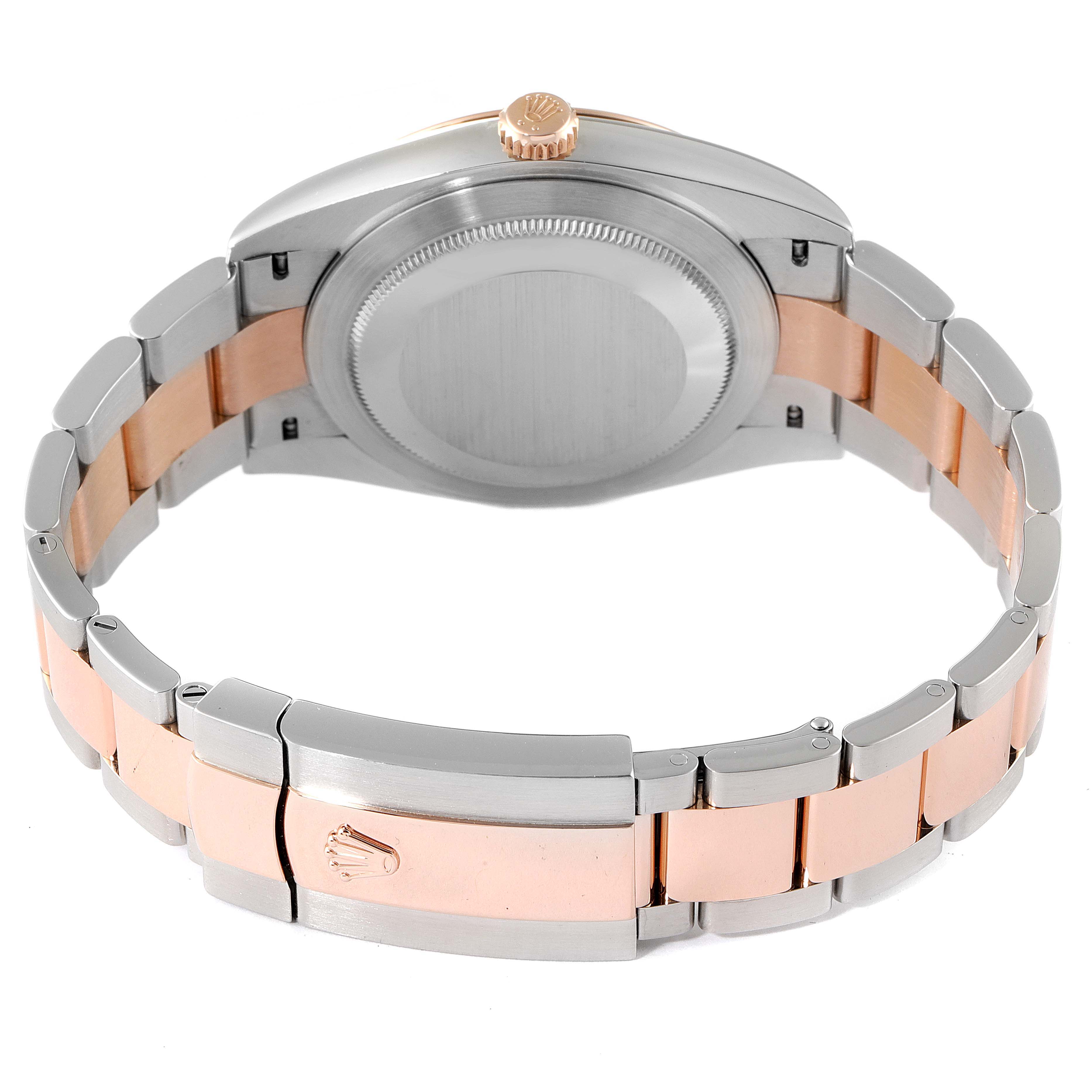 The image shows the back view of a Rolex Datejust 41 126301 Men's Steel and Gold (two tone) Pink Dial 126301 Men's Steel and Gold (two tone) Pink Dial model, highlighting the clasp, bracelet, and case back.