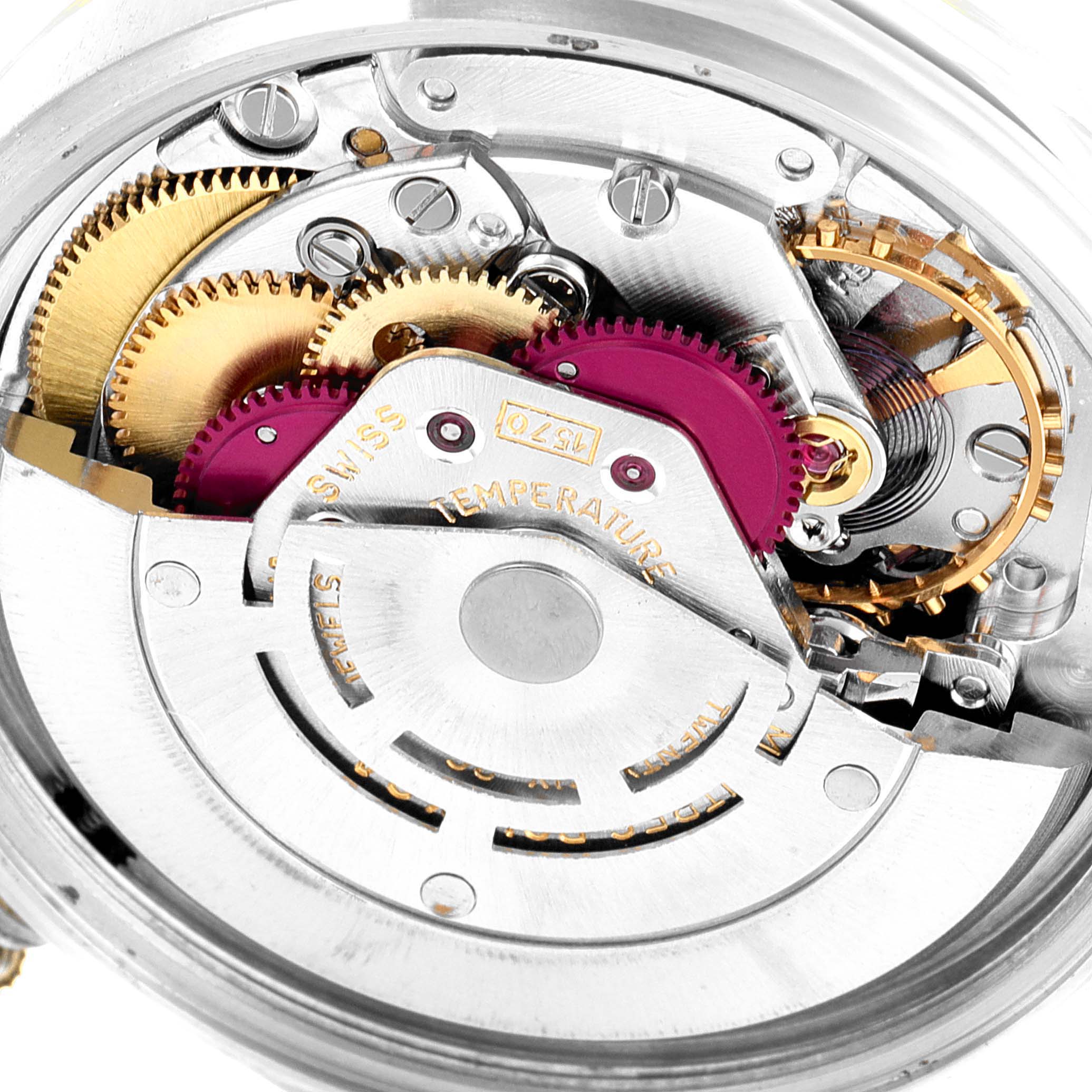 The image shows the internal mechanism and gears of a Rolex Vintage Collection 1601 Men's Steel and Gold (two tone) Champagne Dial 1601 Men's Steel and Gold (two tone) Champagne Dial watch from a close-up angle.