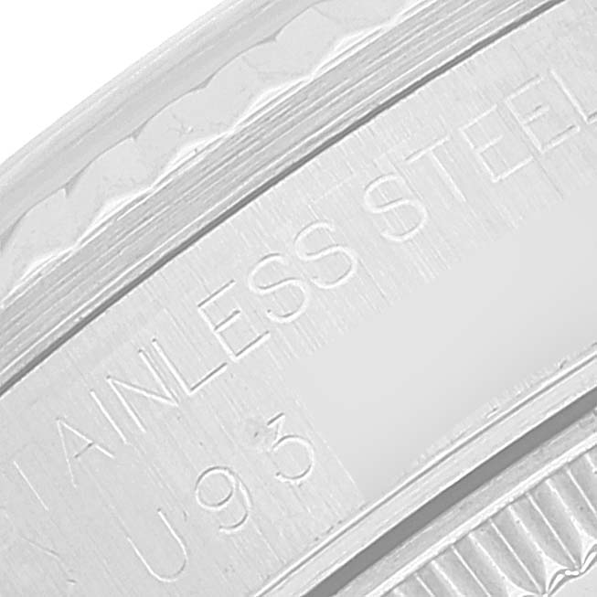 This close-up image shows part of the stainless steel caseback of a Rolex Mid-Size 68274 Women's Stainless Steel Blue Dial 68274 Women's Stainless Steel Blue Dial model watch.