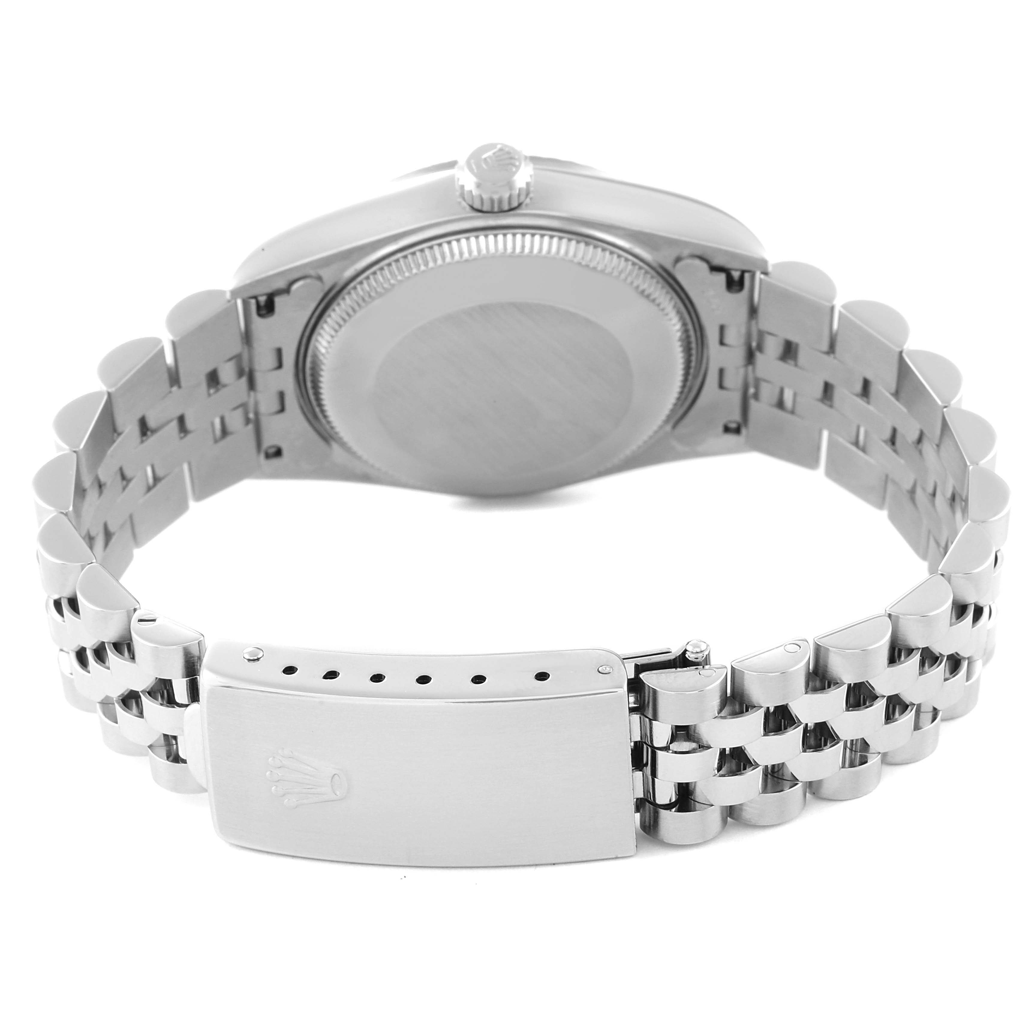 The image shows the back and clasp of a Rolex Mid-Size 68274 Women's Stainless Steel Blue Dial 68274 Women's Stainless Steel Blue Dial model watch, highlighting its bracelet and caseback.