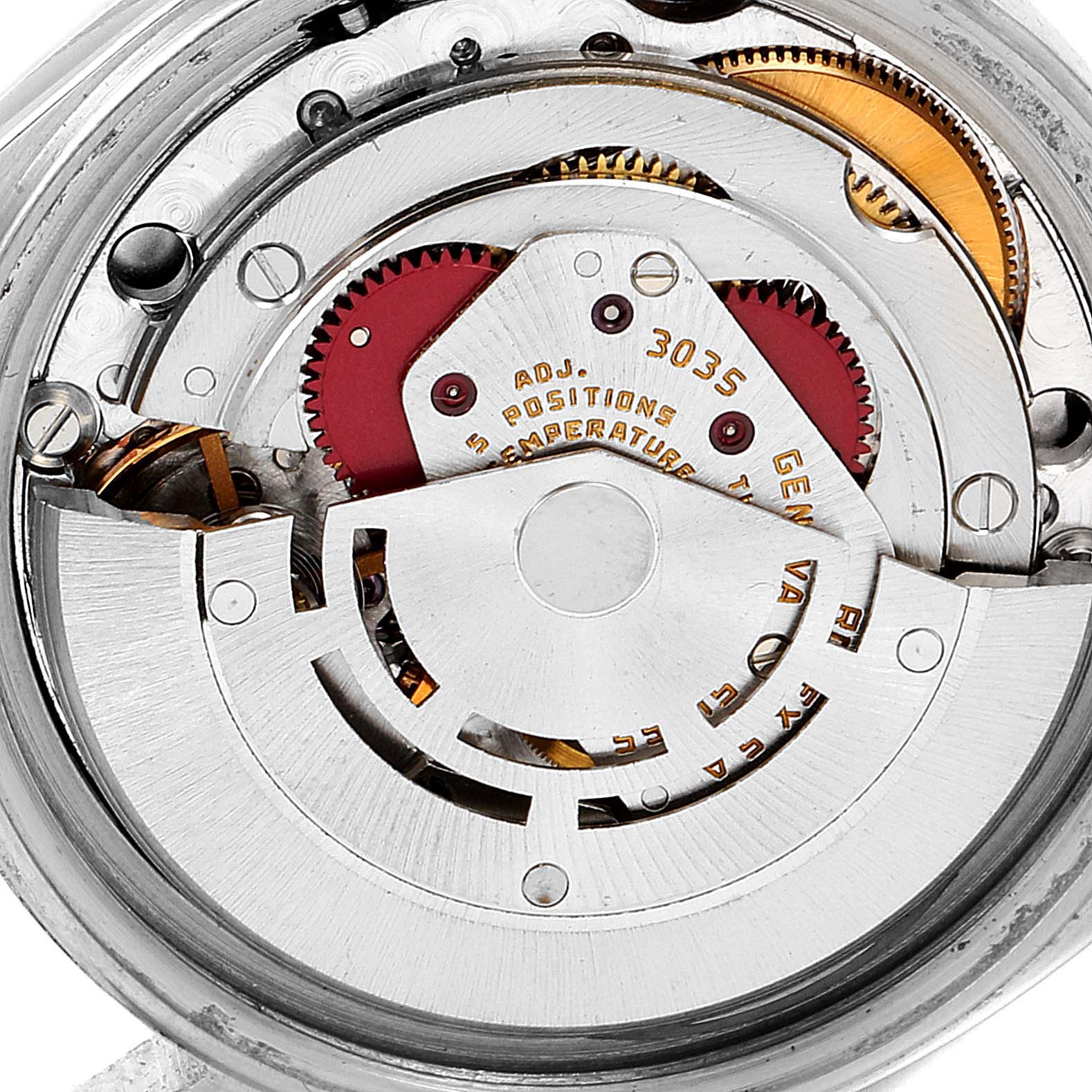 The image shows the movement mechanism of a Vintage Collection model Rolex watch, viewed from the back.