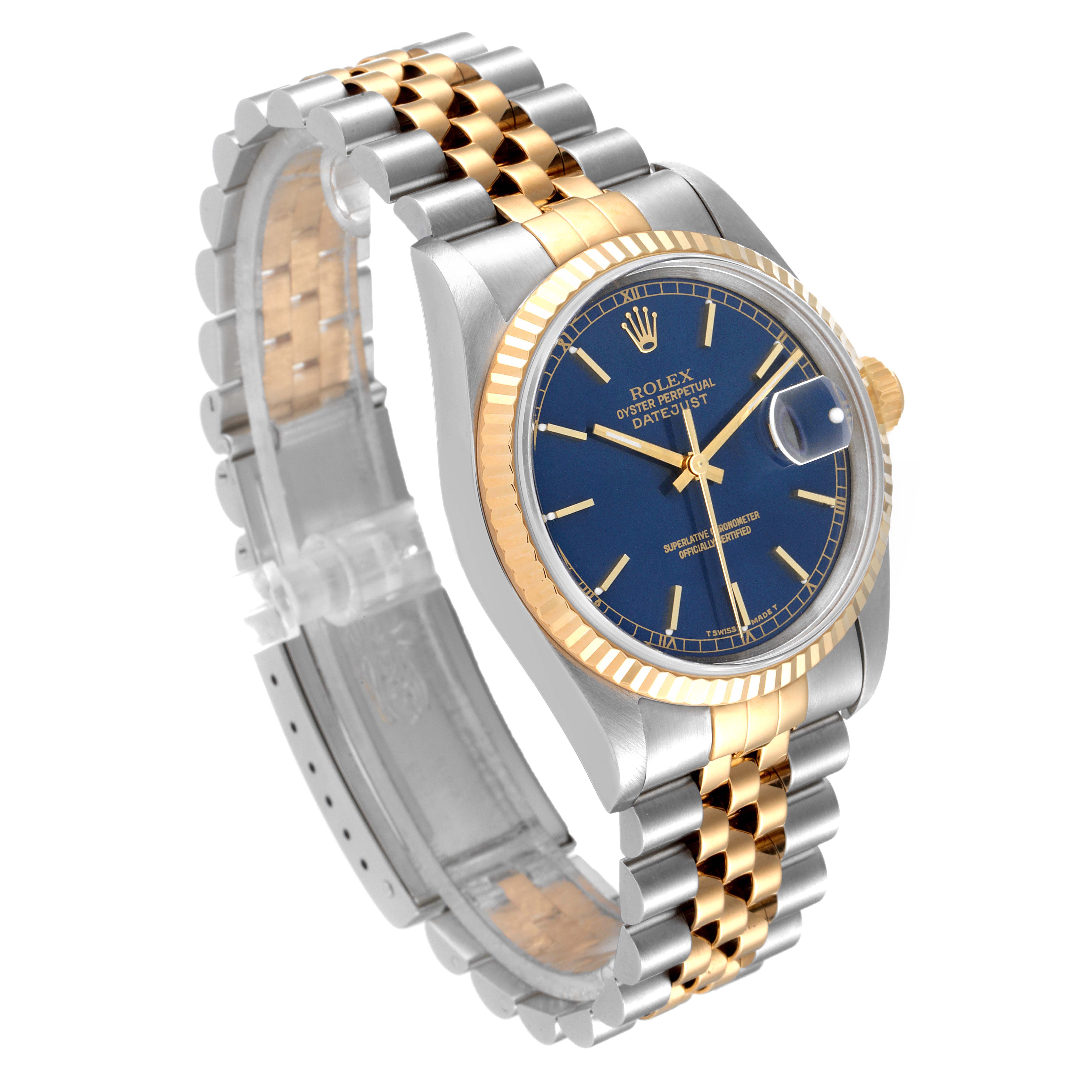 This image shows a Rolex Datejust 16233 Men's Steel and Gold (two tone) Blue Dial 16233 Men's Steel and Gold (two tone) Blue Dial watch at a front angle, highlighting the blue dial, fluted bezel, and the two-tone bracelet.