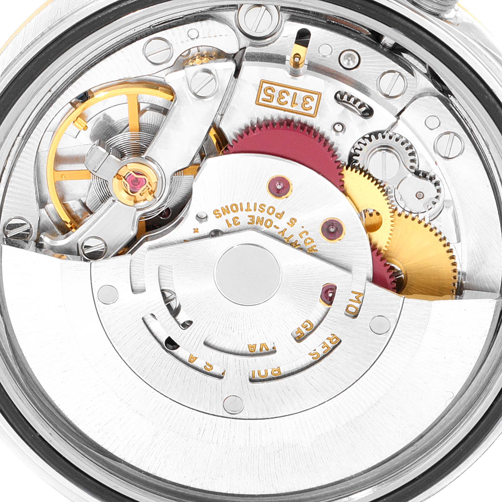 This is a close-up view of the Rolex Datejust 16233 Men's Steel and Gold (two tone) Blue Dial 16233 Men's Steel and Gold (two tone) Blue Dial watch movement, showcasing its intricate internal gears and mechanisms.