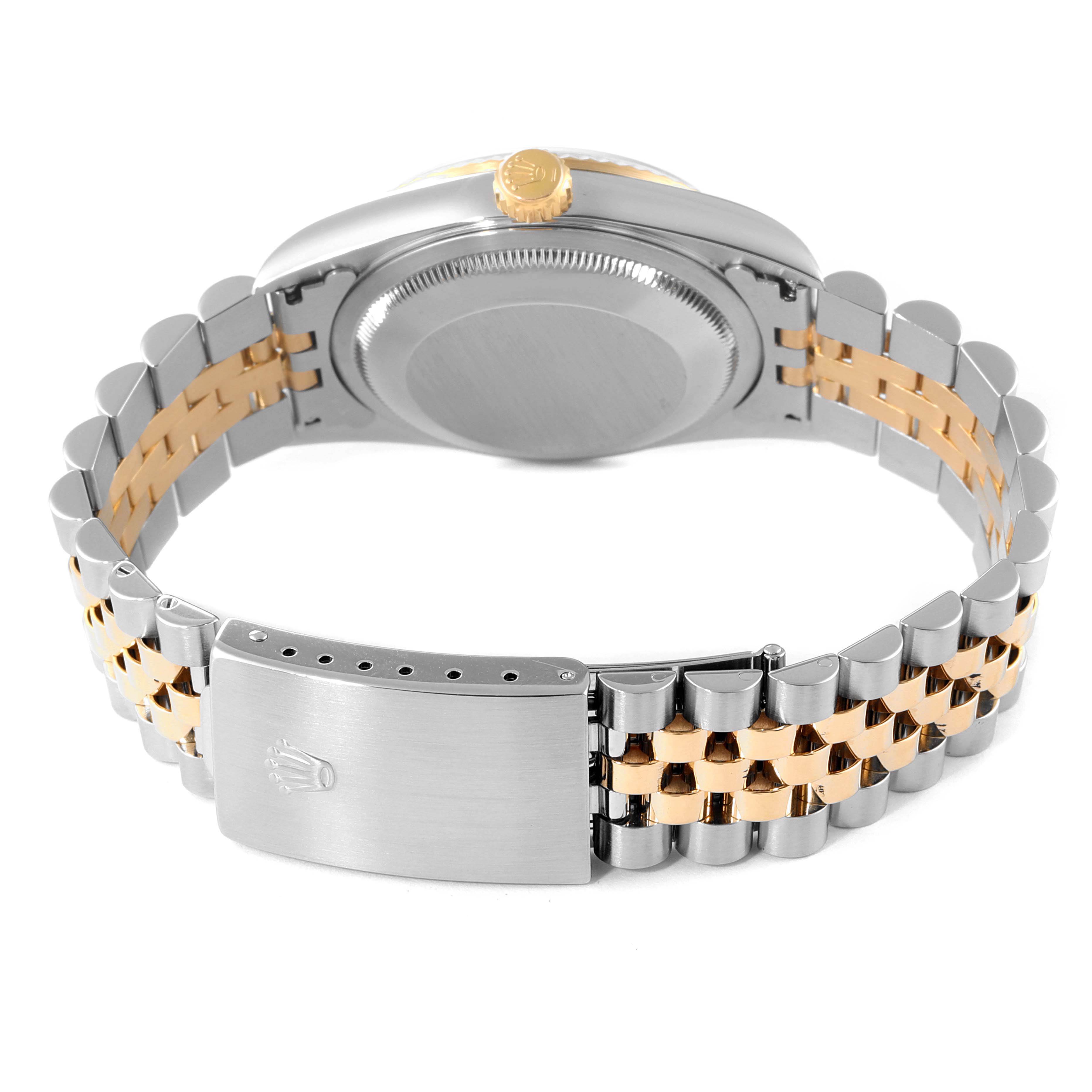 The image shows the back case and jubilee bracelet of the Rolex Datejust 16233 Men's Steel and Gold (two tone) Blue Dial 16233 Men's Steel and Gold (two tone) Blue Dial model watch, highlighting the clasp with the Rolex logo.