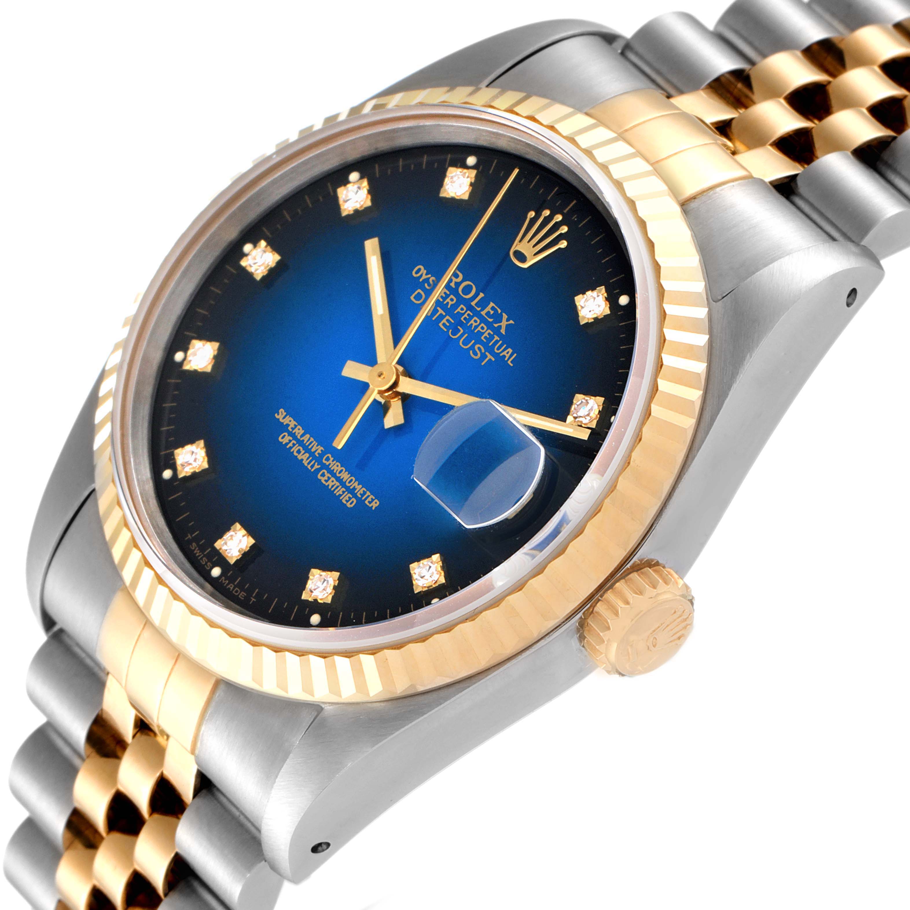 The image shows an angled view of the Rolex Datejust 16233 Men's Steel and Gold (two tone) Blue Dial 16233 Men's Steel and Gold (two tone) Blue Dial watch, highlighting the blue dial, gold bezel, and two-tone bracelet.