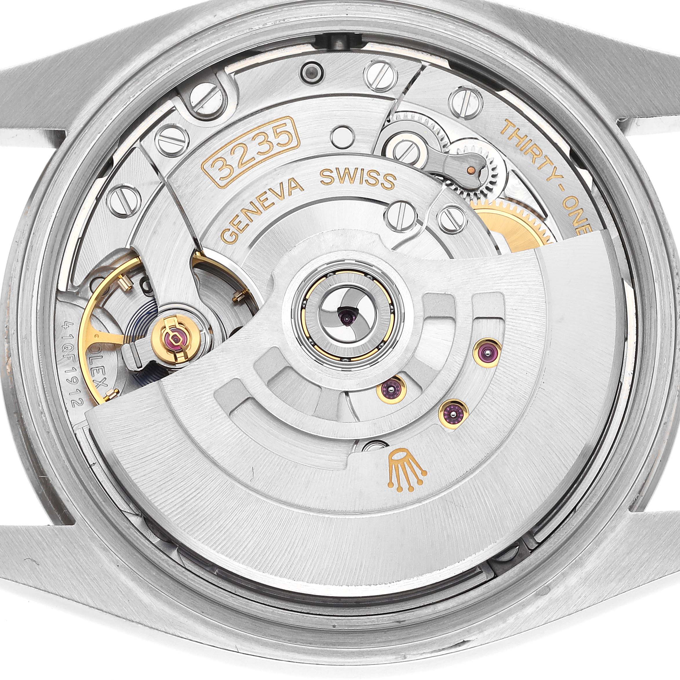 This image shows the Rolex Datejust 126234 Men's Stainless Steel Black Dial 126234 Men's Stainless Steel Black Dial's movement from a back angle, highlighting the rotor and intricate inner mechanics.