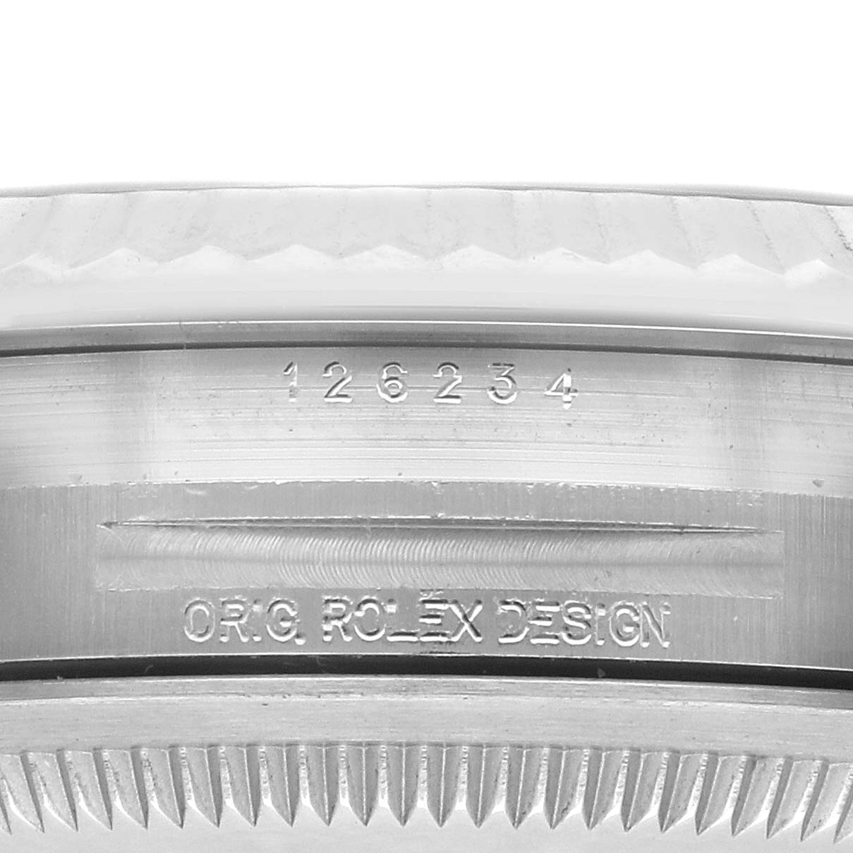 The image shows the side view of a Rolex Datejust 126234 Men's Stainless Steel Black Dial 126234 Men's Stainless Steel Black Dial watch, focusing on the engraved bezel and case details.