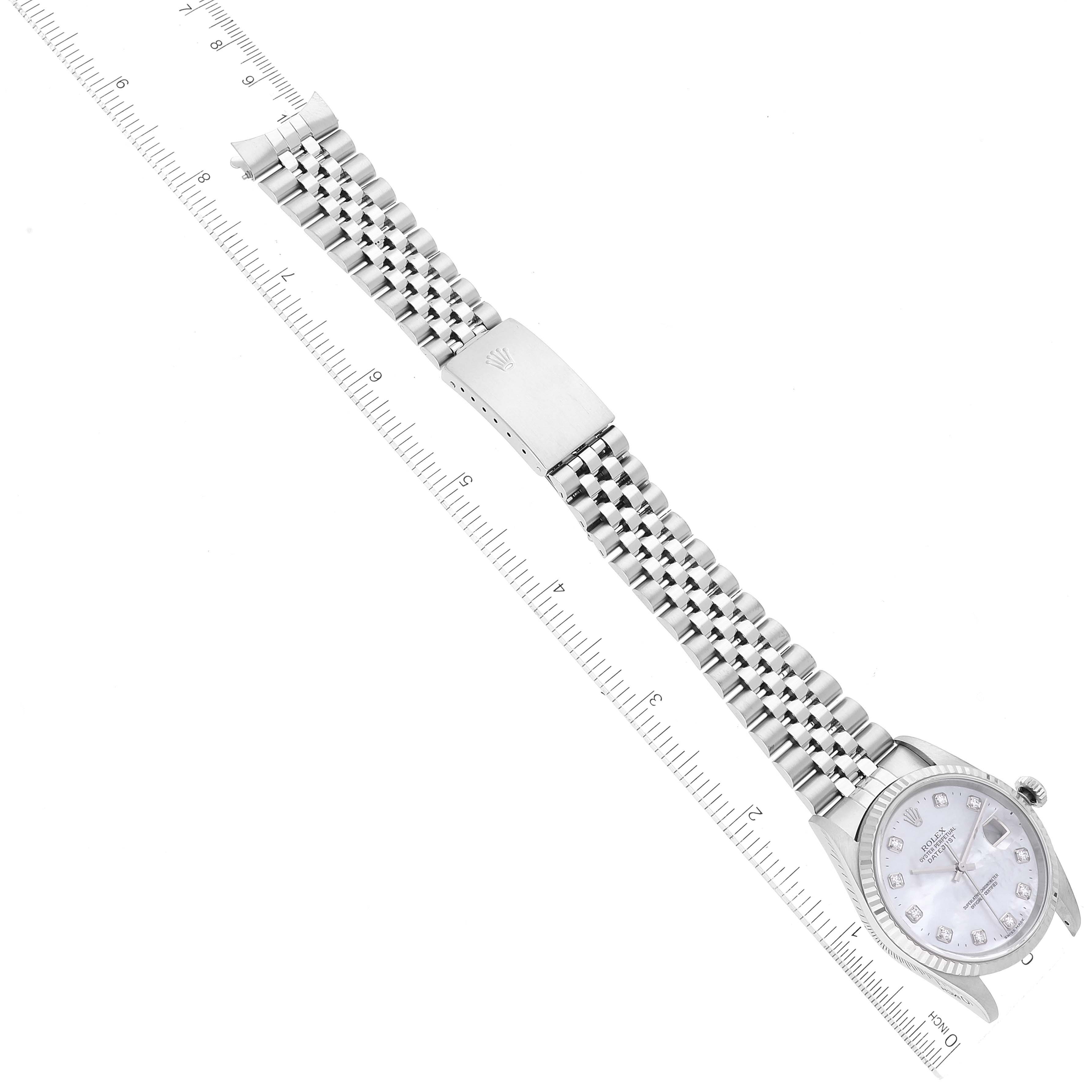 The image shows a Rolex Datejust 16234 Men's Stainless Steel Mother of Pearl Dial 16234 Men's Stainless Steel Mother of Pearl Dial watch laid flat displaying the bracelet, clasp, and dial from a top-down angle.