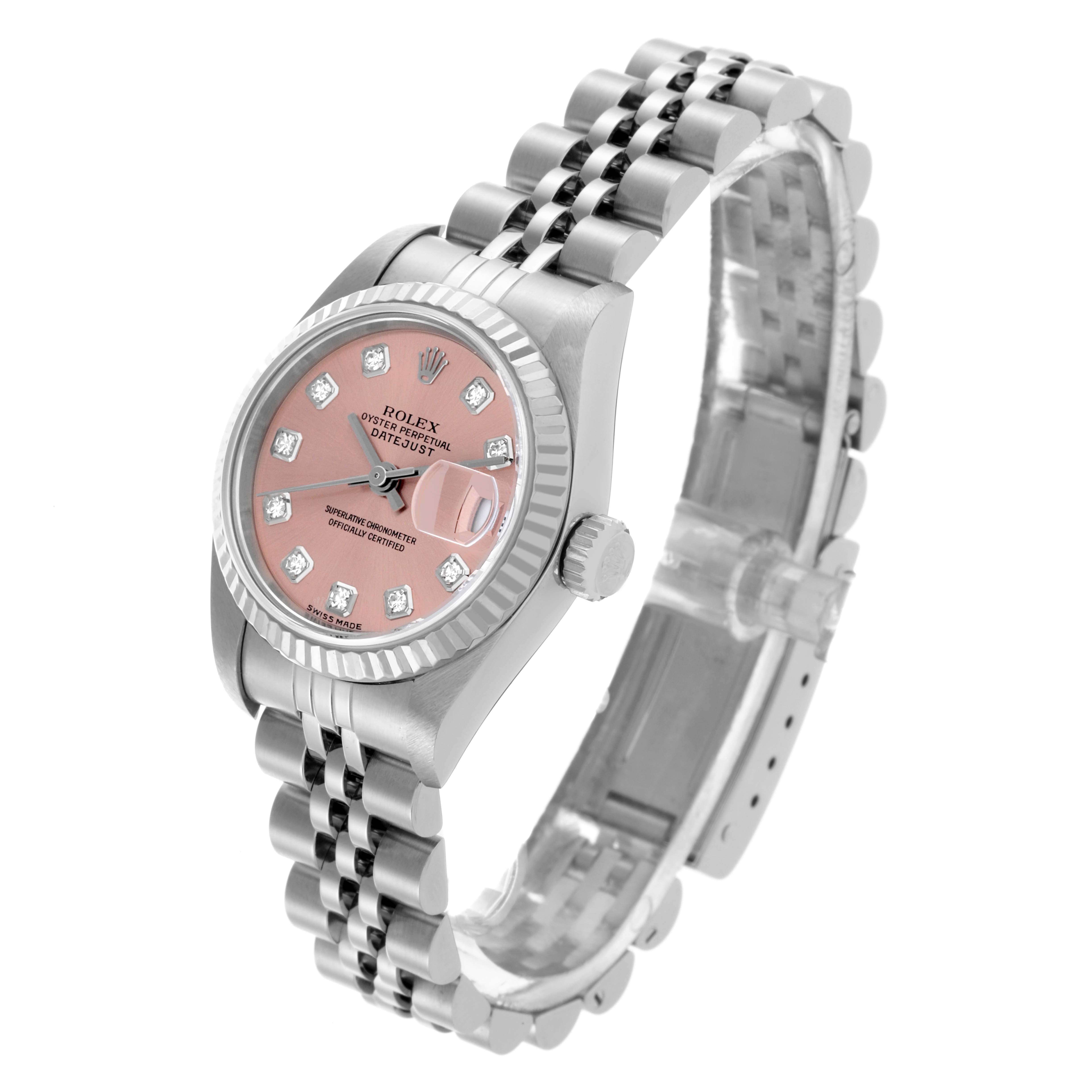 The Rolex Datejust 79174 Women's Stainless Steel Pink Dial 79174 Women's Stainless Steel Pink Dial watch is shown at a three-quarter angle, highlighting the dial, fluted bezel, and Jubilee bracelet.
