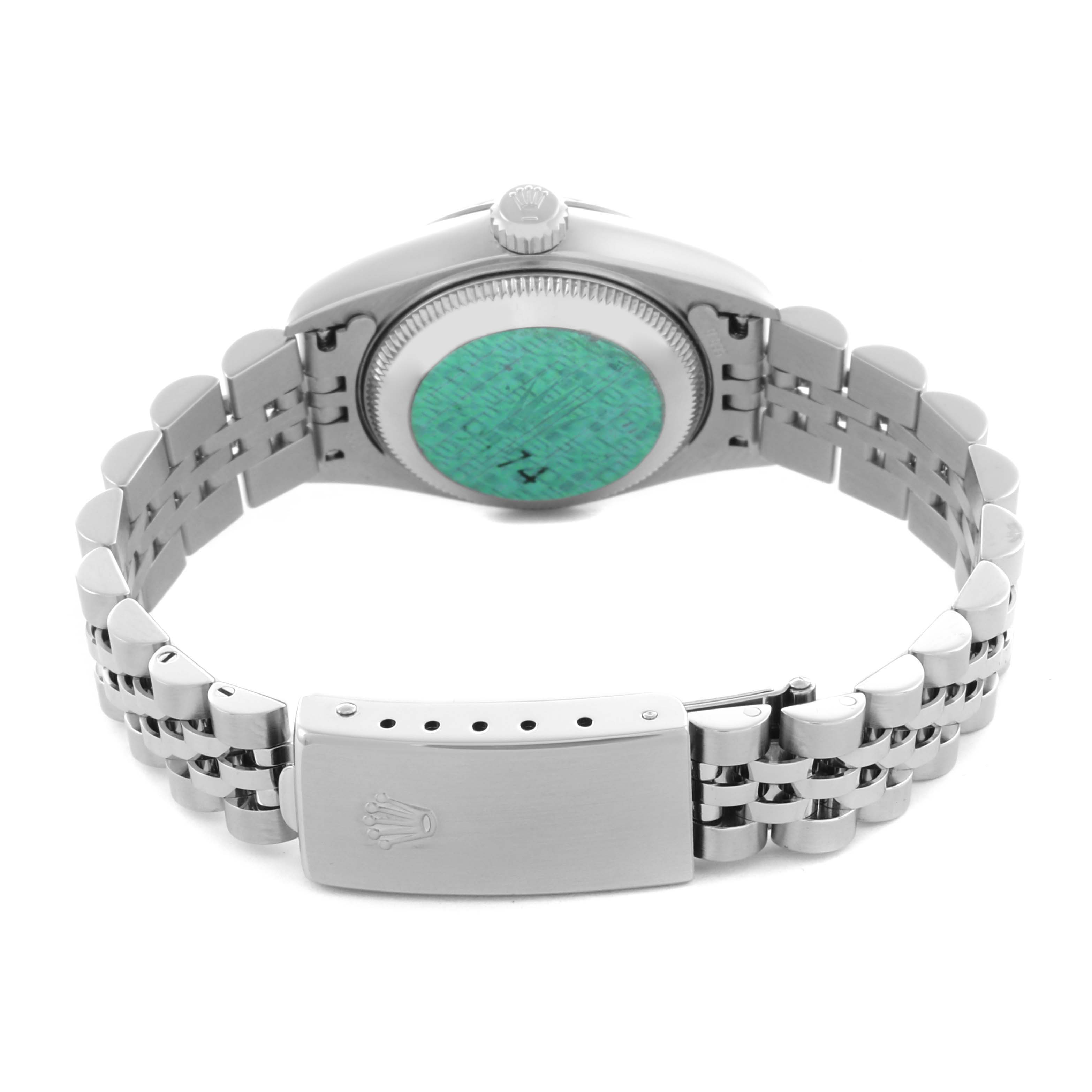 The image shows the back and clasp of a Rolex Datejust 79174 Women's Stainless Steel Pink Dial 79174 Women's Stainless Steel Pink Dial watch, highlighting its bracelet and case back.