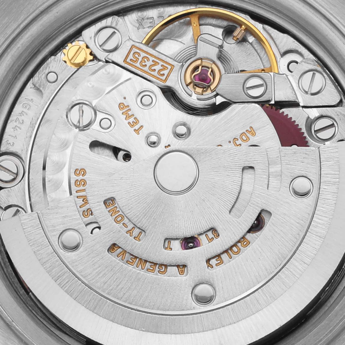 This image shows the movement mechanism of the Rolex Datejust 79174 Women's Stainless Steel Pink Dial 79174 Women's Stainless Steel Pink Dial, highlighting gears and the rotor.